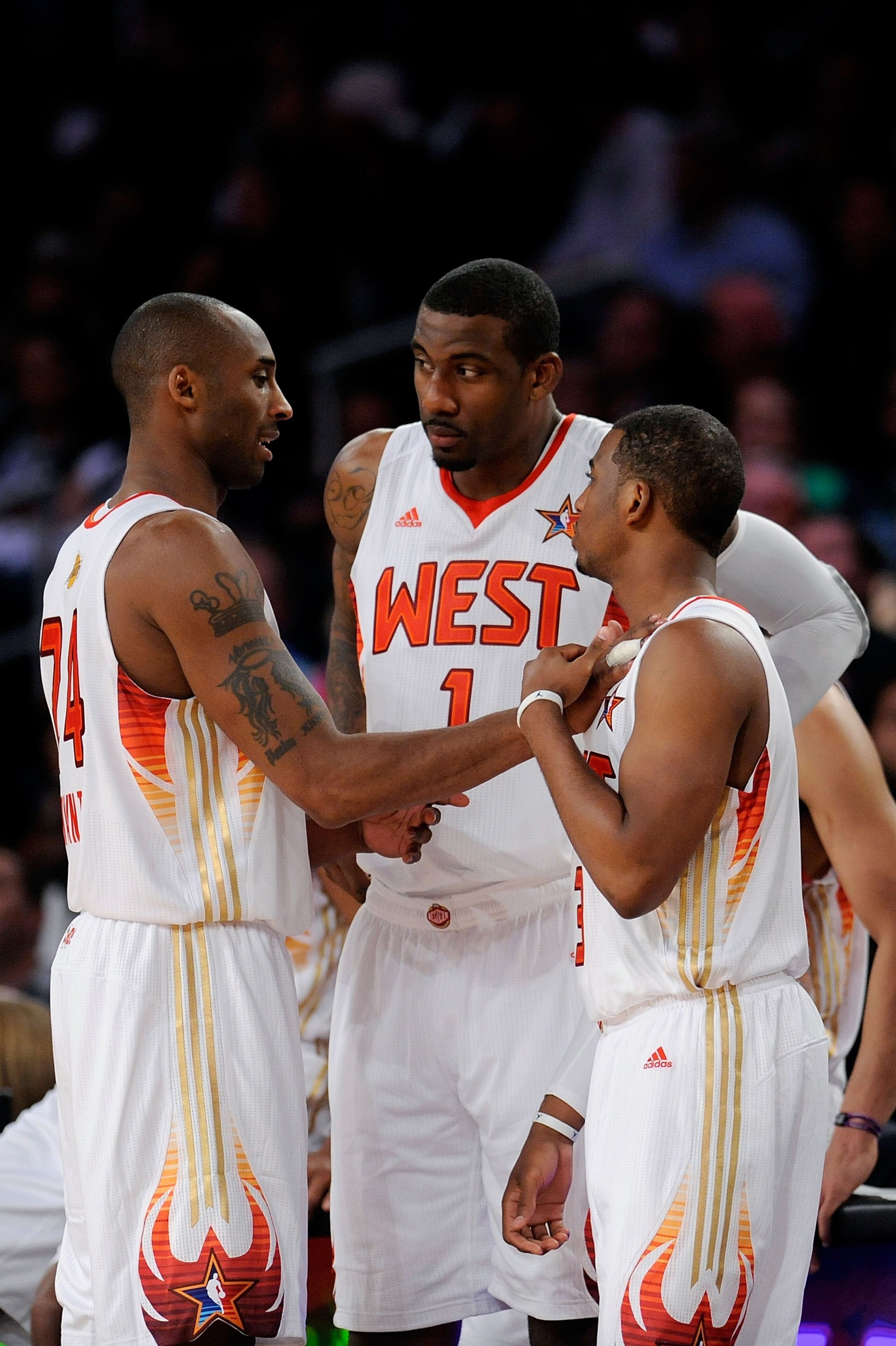 PHOENIX - FEBRUARY 15:  Kobe Bryant #24 talks to Amar'e Stoudemire #1 and Chris Paul #3 of the Western Conference during the 58th NBA All-Star Game, part of 2009 NBA All-Star Weekend at US Airways Center on February 15, 2009 in Phoenix, Arizona.  NOTE TO