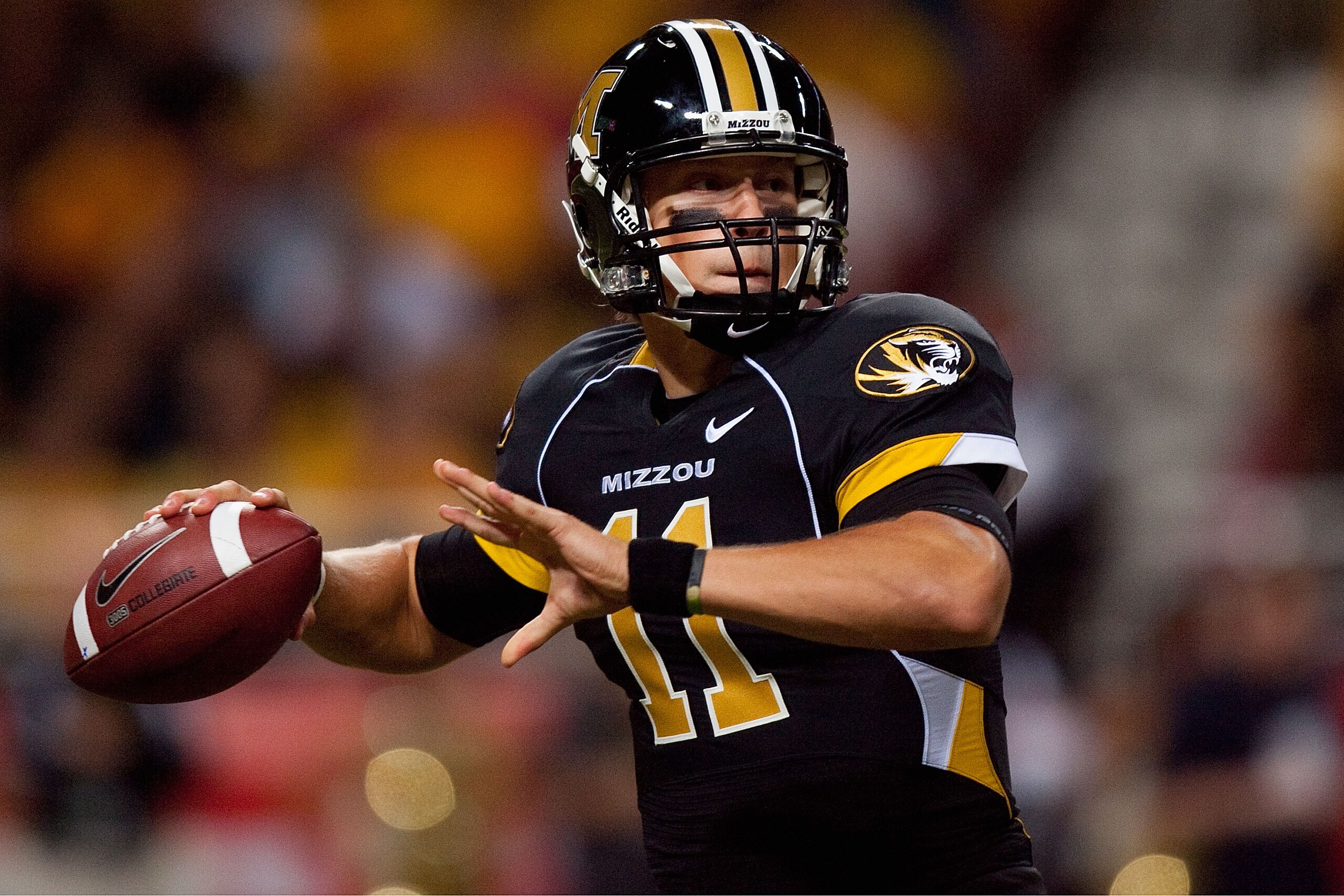 ST. LOUIS - SEPTEMBER 4: Blaine Gabbert #11 of the University of Missouri Tigers looks to pass against the University of Illinois Fighting Illini during the State Farm Arch Rivalry game on September 4, 2010 at the Edward Jones Dome in St. Louis, Missouri. ST. LOUIS - SEPTEMBER 4: Blaine Gabbert #11 of the University of Missouri Tigers looks to pass against the University of Illinois Fighting Illini during the State Farm Arch Rivalry game on September 4, 2010 at the Edward Jones Dome in St. Louis, Missouri.