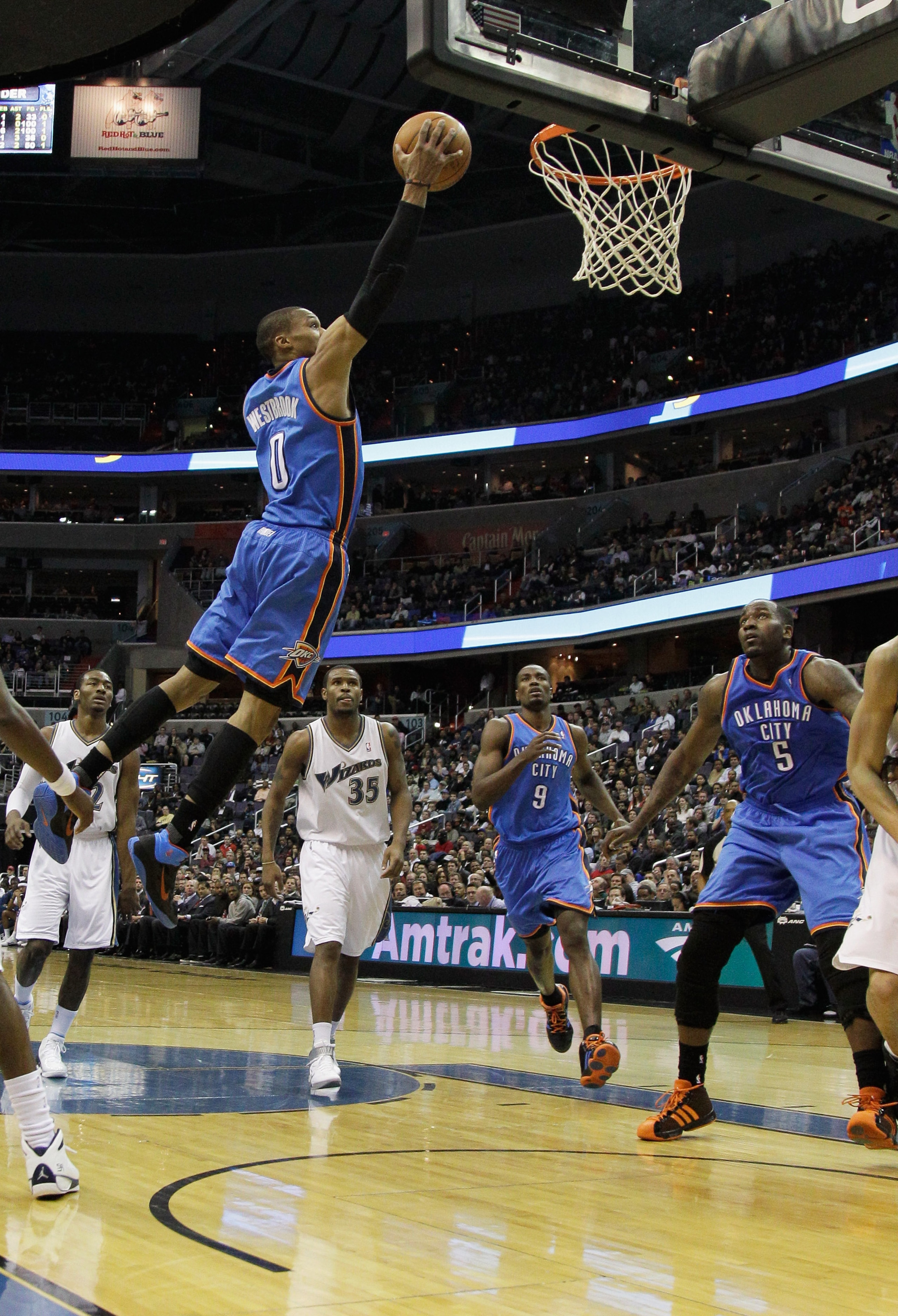 WASHINGTON, DC - MARCH 14: Russell Westbrook #0 of the Oklahoma City Thunder puts up a shot against the Washington Wizards during the first half at the Verizon Center on March 14, 2011 in Washington, DC. NOTE TO USER: User expressly acknowledges and agree