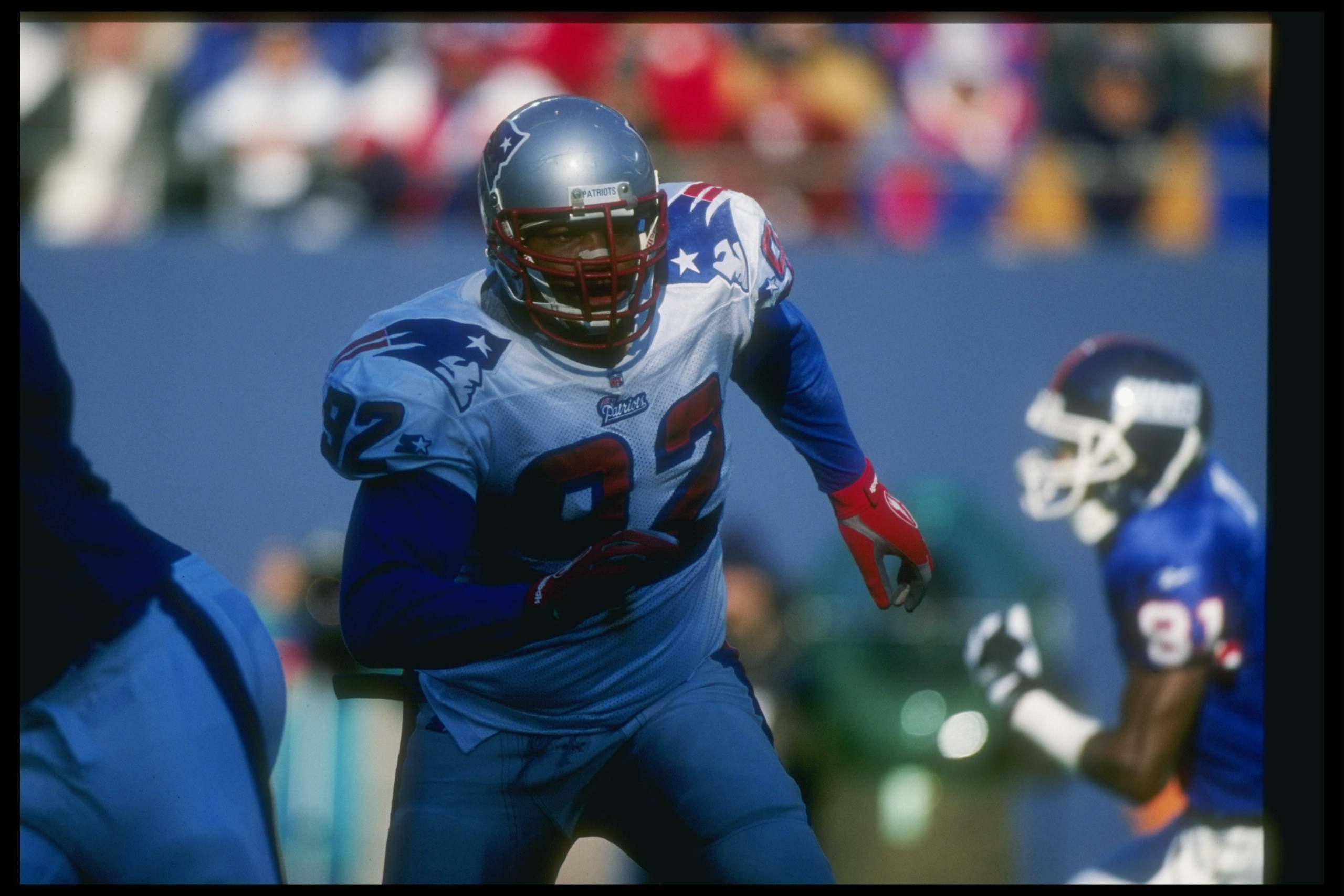 21 Dec 1996:  Defensive lineman Ferric Collons of the New England Patriots looks on during a game against the New York Giants at Giants Stadium in East Rutherford, New Jersey.  The Patriots won the game, 23-22. Mandatory Credit: Doug Pensinger  /Allsport