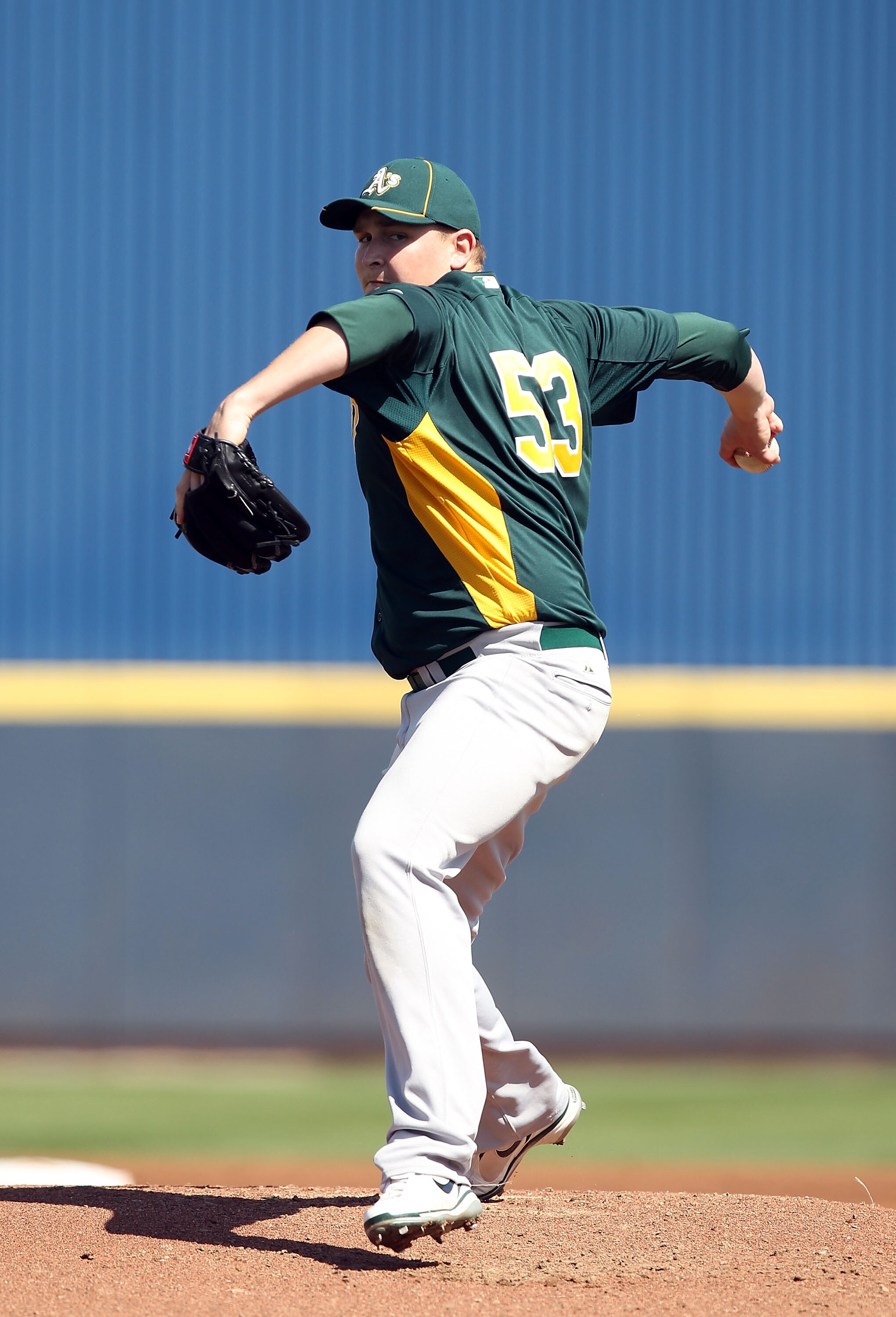 PHOENIX, AZ - MARCH 03:  Starting pitcher Trevor Cahill #53 of the Oakland Athletics pitches against the Milwaukee Brewers during the spring training game at Maryvale Baseball Park on March 3, 2011 in Phoenix, Arizona.  (Photo by Christian Petersen/Getty