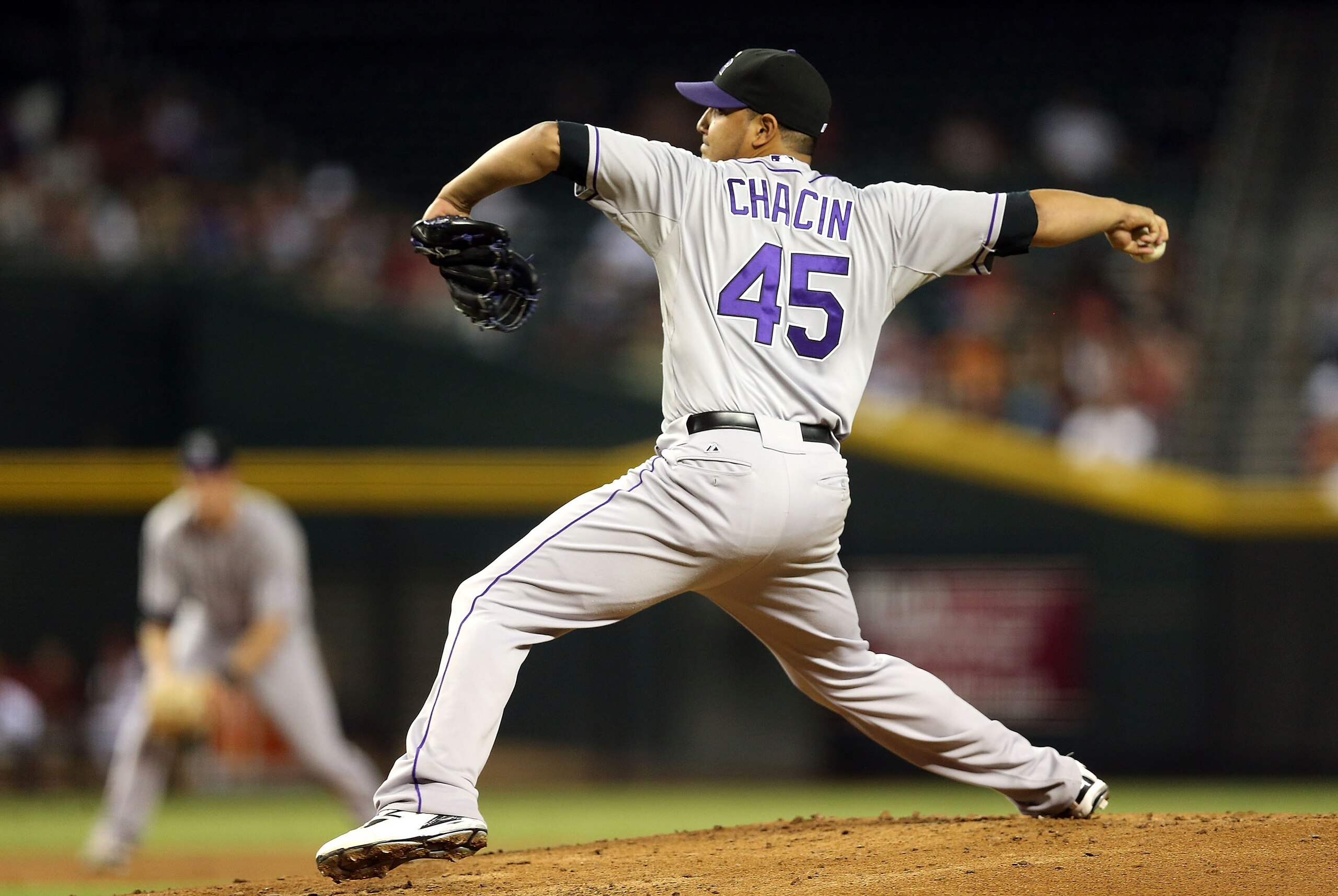 PHOENIX, AZ - OCTOBER 02:  Relief pitcher Jhoulys Chacin #45 of the Colorado Rockies pitches against the Arizona Diamondbacks during the MLB game at Chase Field on October 2, 2012 in Phoenix, Arizona.  (Photo by Christian Petersen/Getty Images)