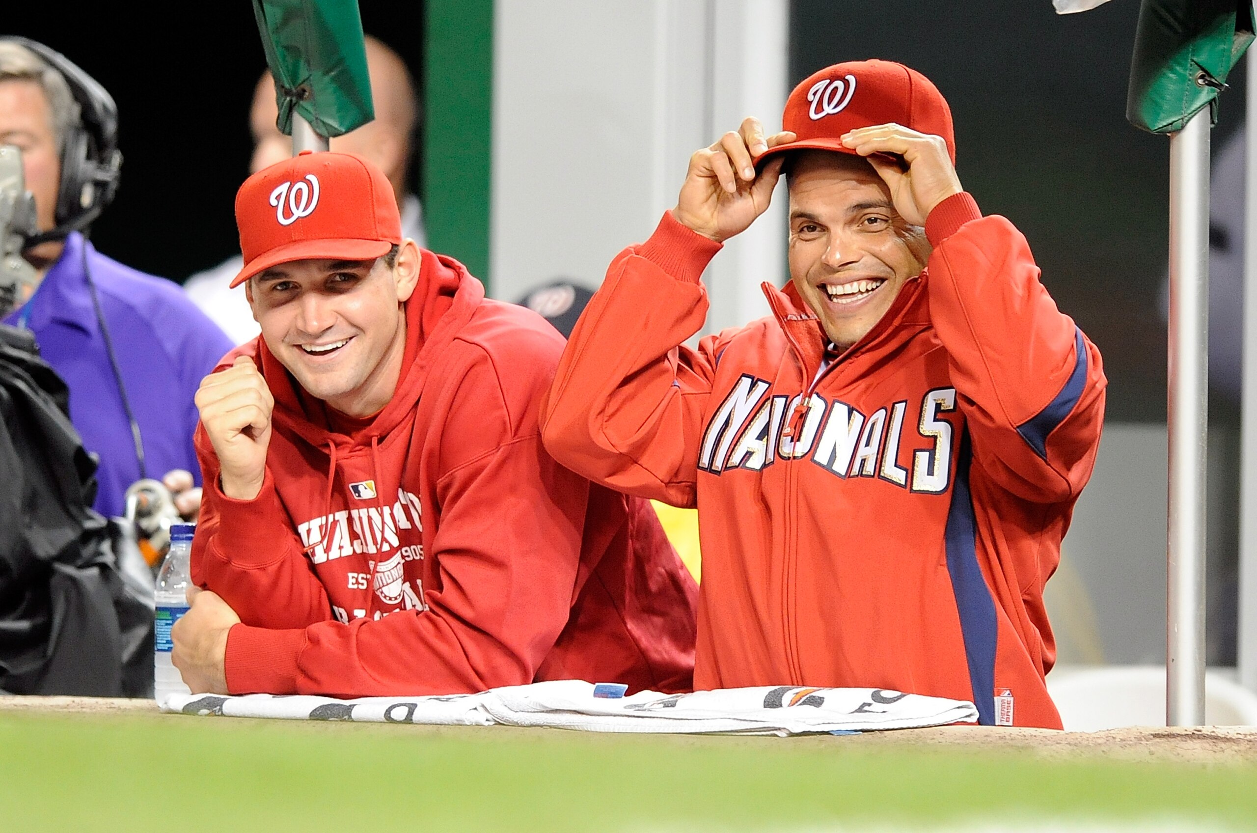 WASHINGTON - SEPTEMBER 29:  Ryan Zimmerman #11 and Ivan Rodriguez #7 of the Washington Nationals watch the game against the Philadelphia Phillies at Nationals Park on September 29, 2010 in Washington, DC.  (Photo by Greg Fiume/Getty Images)