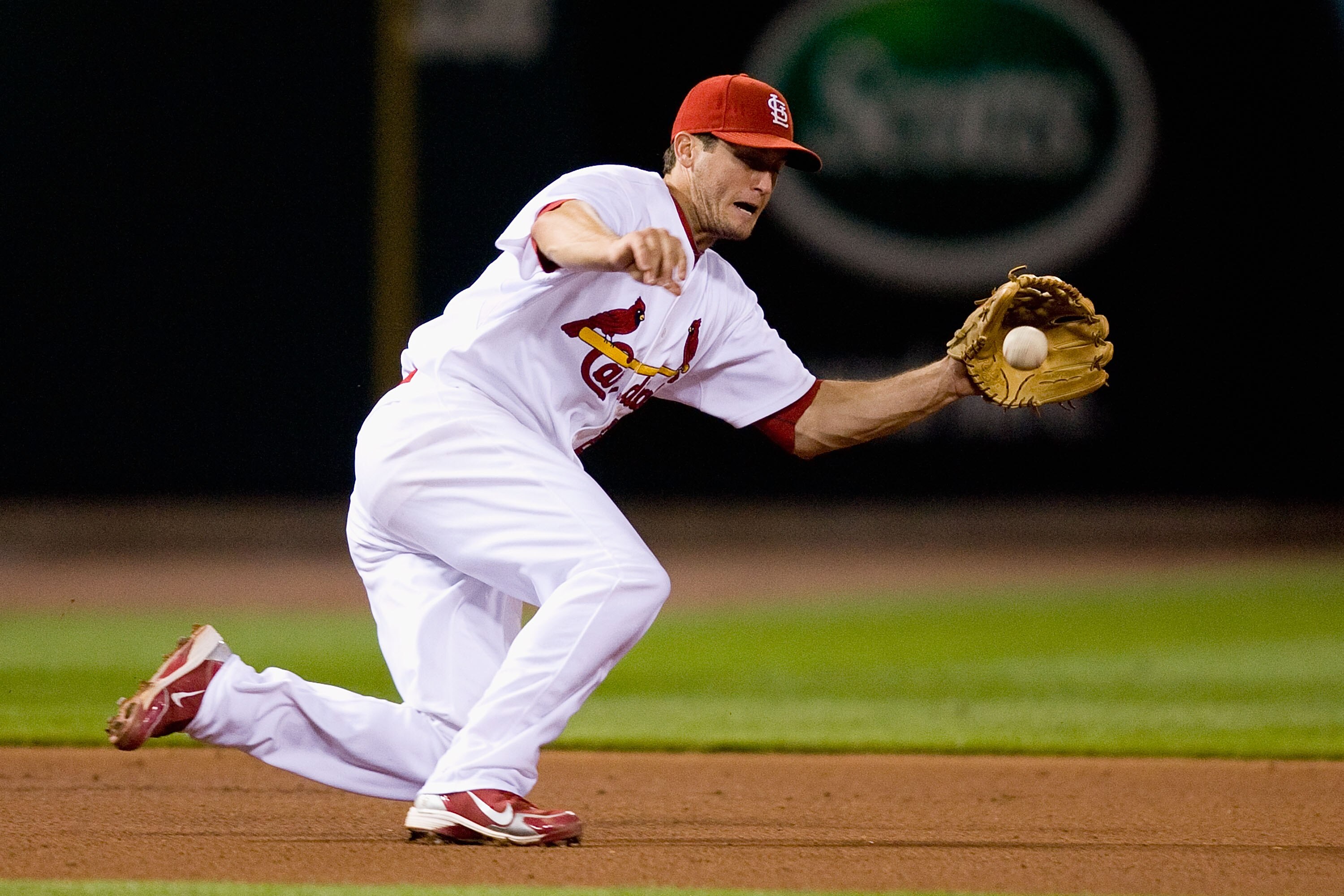ST. LOUIS - MAY 18:  David Freese #23 of the St. Louis Cardinals  fields a line drive against the Washington Nationals at Busch Stadium on May 18, 2010 in St. Louis, Missouri.  The Cardinals beat the Nationals 3-2.  (Photo by Dilip Vishwanat/Getty Images)