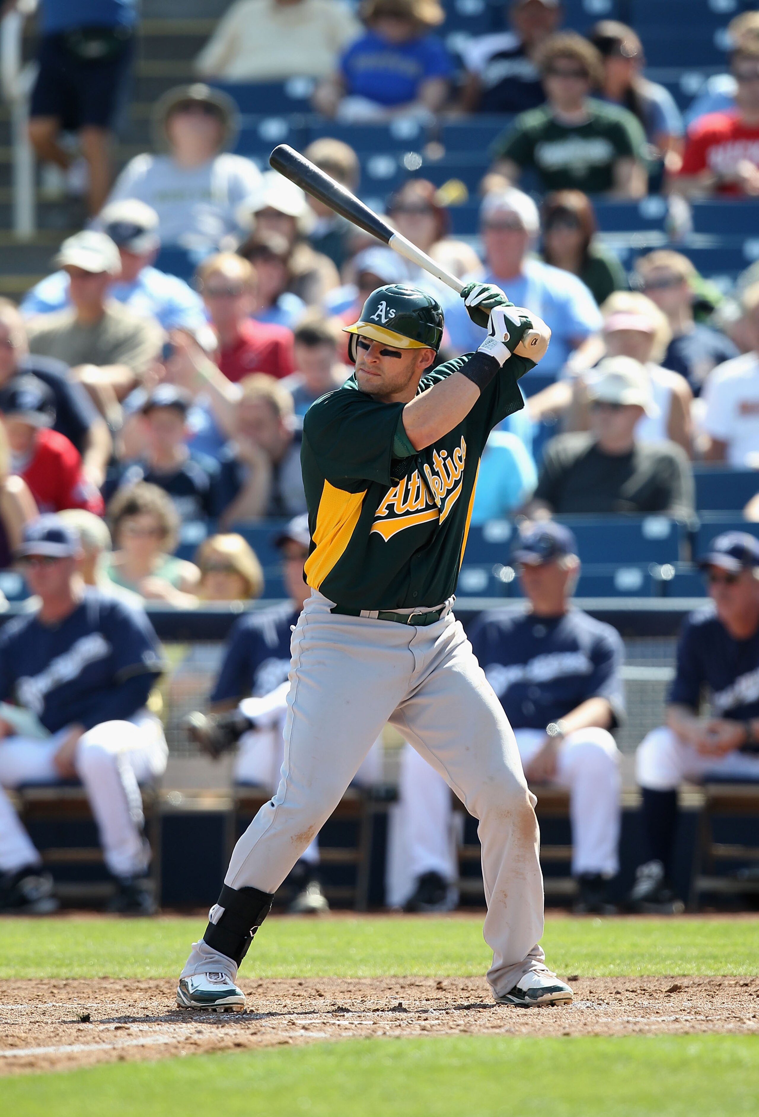 PHOENIX, AZ - MARCH 03:  Daric Barton #10 of the Oakland Athletics bats against the Milwaukee Brewers during the spring training game at Maryvale Baseball Park on March 3, 2011 in Phoenix, Arizona.  (Photo by Christian Petersen/Getty Images)