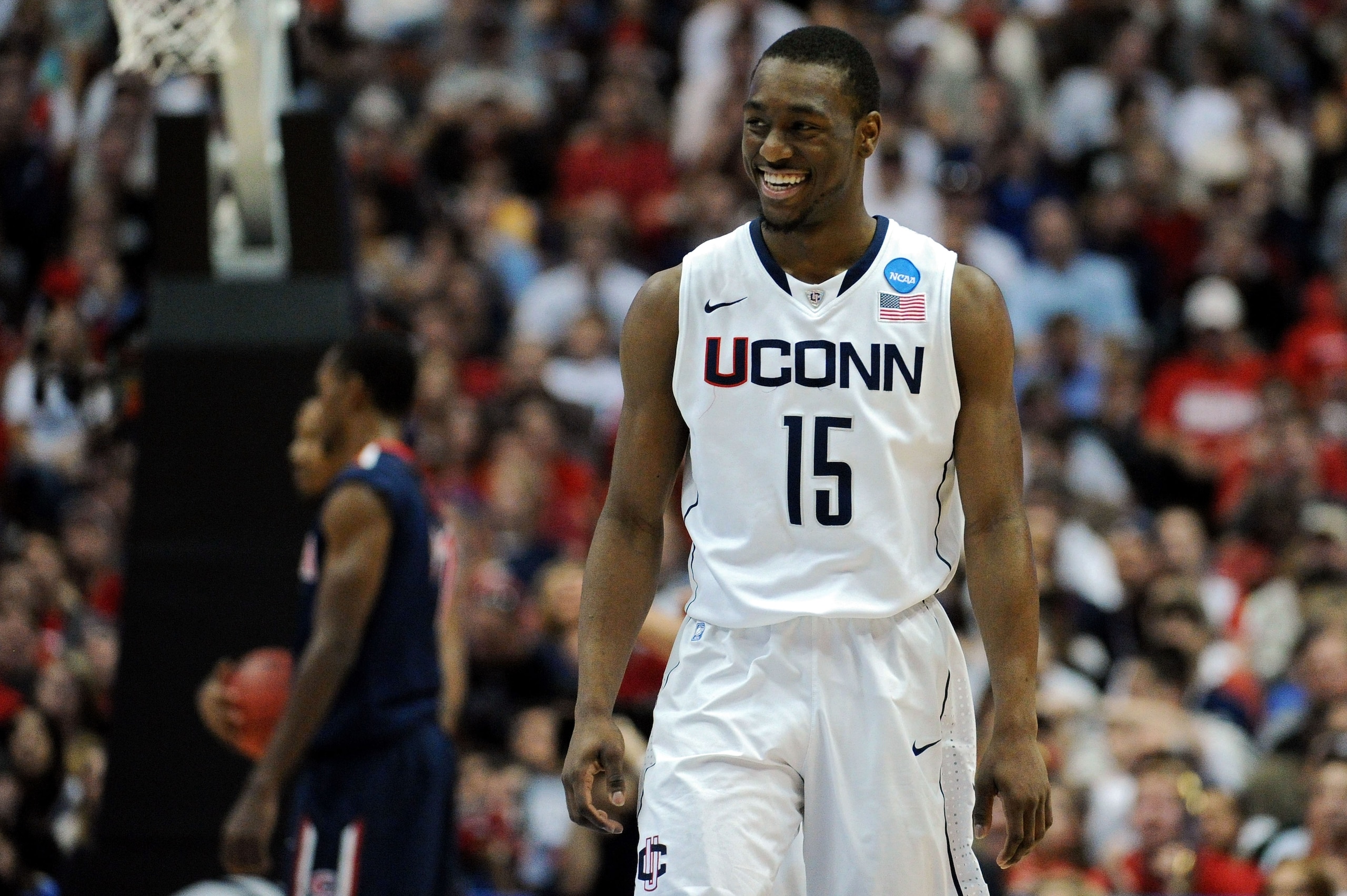 ANAHEIM, CA - MARCH 26:  Kemba Walker #15 of the Connecticut Huskies reacts after a play against the Arizona Wildcats during the west regional final of the 2011 NCAA men's basketball tournament at the Honda Center on March 26, 2011 in Anaheim, California.