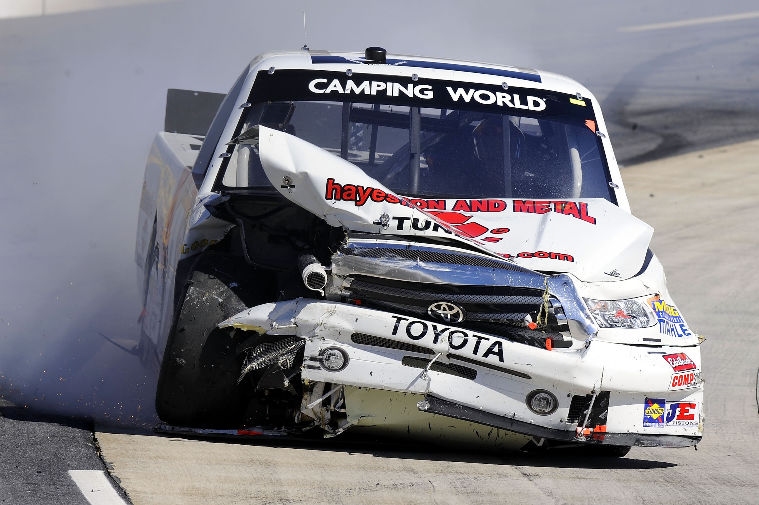 MARTINSVILLE, VA - OCTOBER 23:  Timothy Peters drives the wrecked #17 Nelson Toyota/Red Horse Racing Toyota after an incident in the NASCAR Camping World Truck Series Kroger 200 at Martinsville Speedway on October 23, 2010 in Martinsville, Virginia.  (Pho
