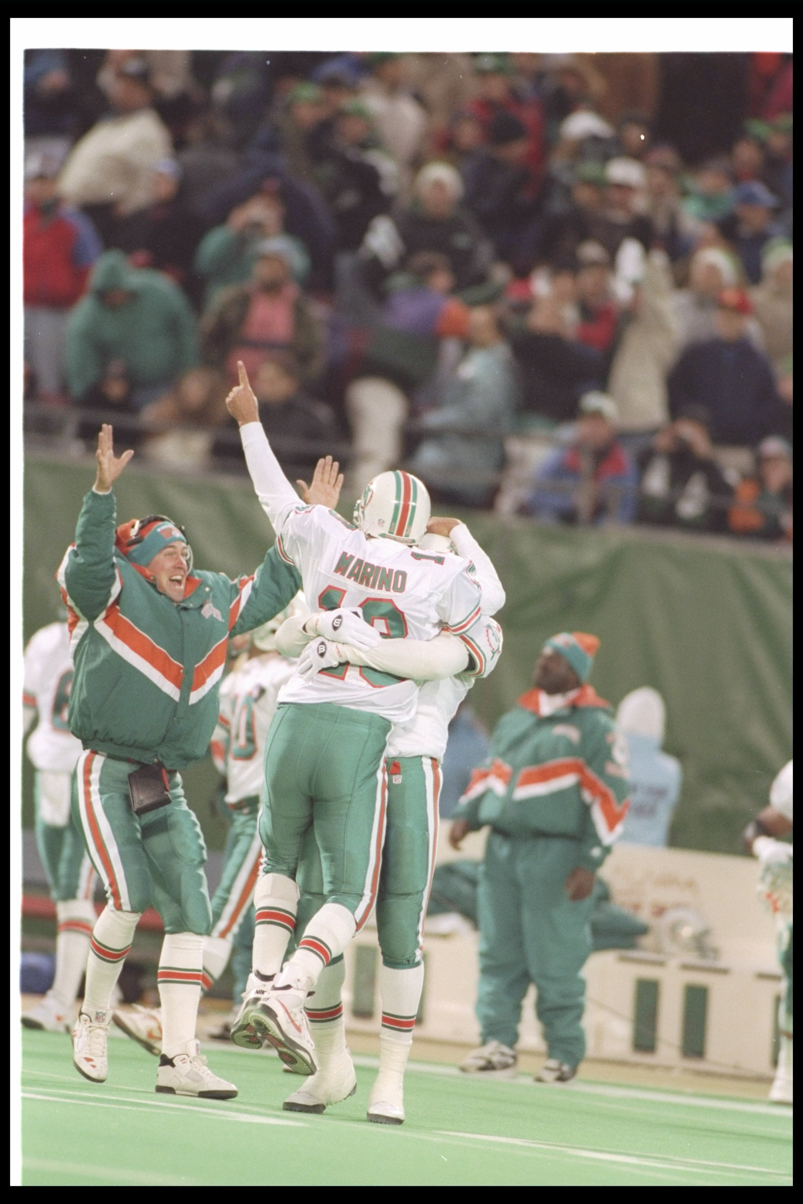 30 Nov 1994:  Quarterback Dan Marino of the Miami Dolphins celebrates during a game against the New York Jets at Giants Stadium in East Rutherford, New Jersey.  The Dolphins won the game, 28-24. Mandatory Credit: Simon Bruty  /Allsport