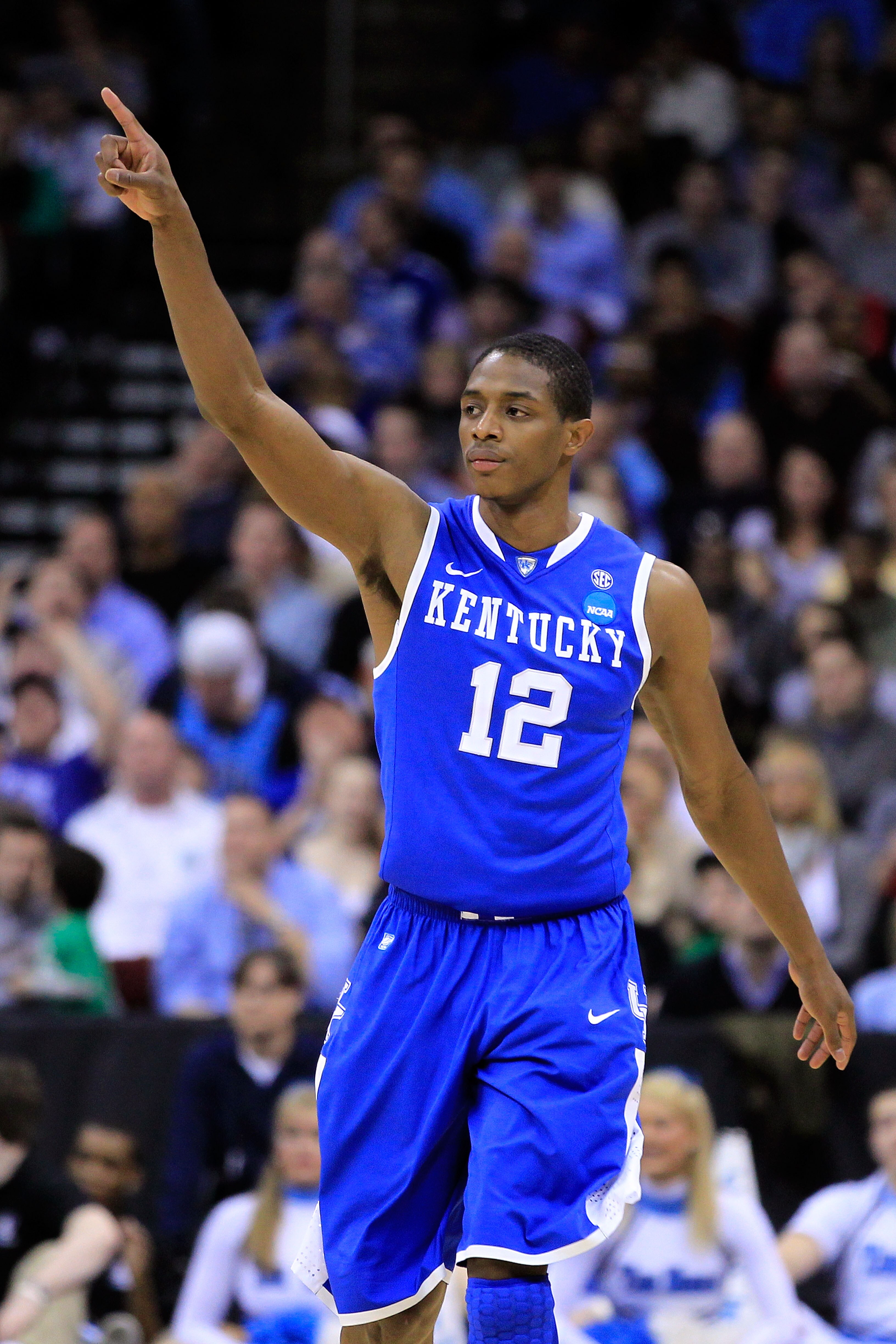 NEWARK, NJ - MARCH 27:  Brandon Knight #12 of the Kentucky Wildcats celebrates after a play against the North Carolina Tar Heels during the second half of the east regional final of the 2011 NCAA men's basketball tournament at Prudential Center on March 2