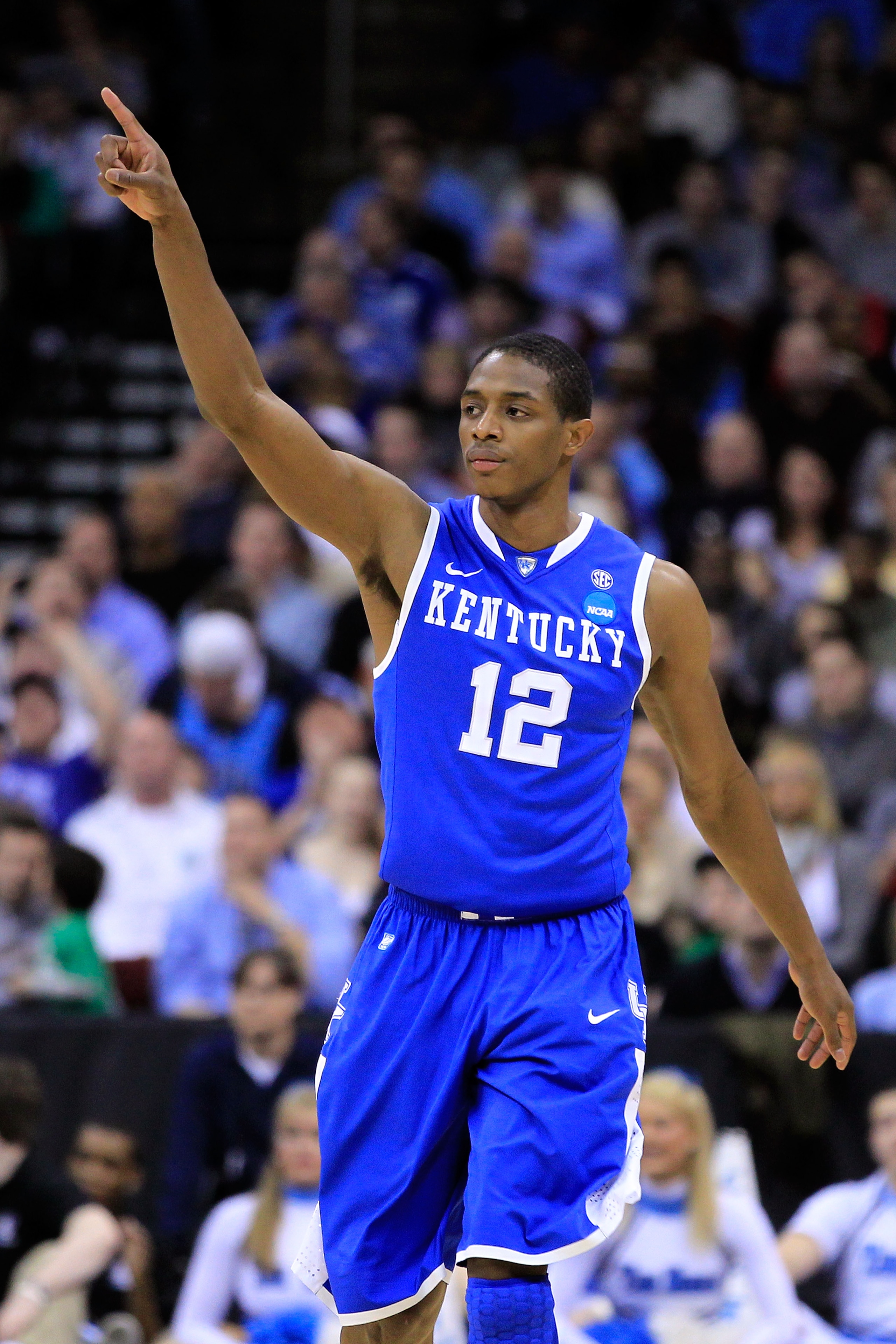 NEWARK, NJ - MARCH 27:  Brandon Knight #12 of the Kentucky Wildcats celebrates after a play against the North Carolina Tar Heels during the second half of the east regional final of the 2011 NCAA men's basketball tournament at Prudential Center on March 2