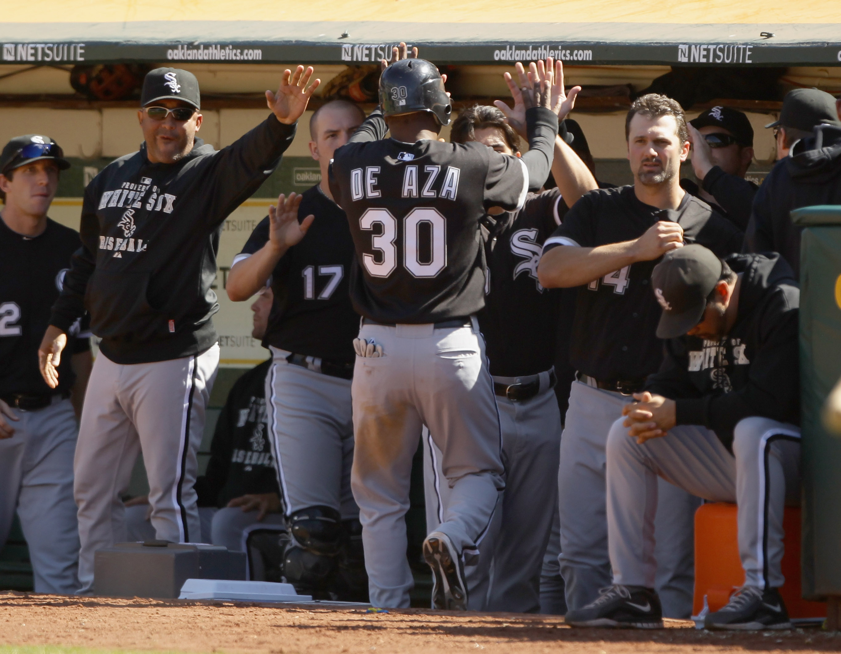 The Chicago White Sox baseball team congratulates each other with