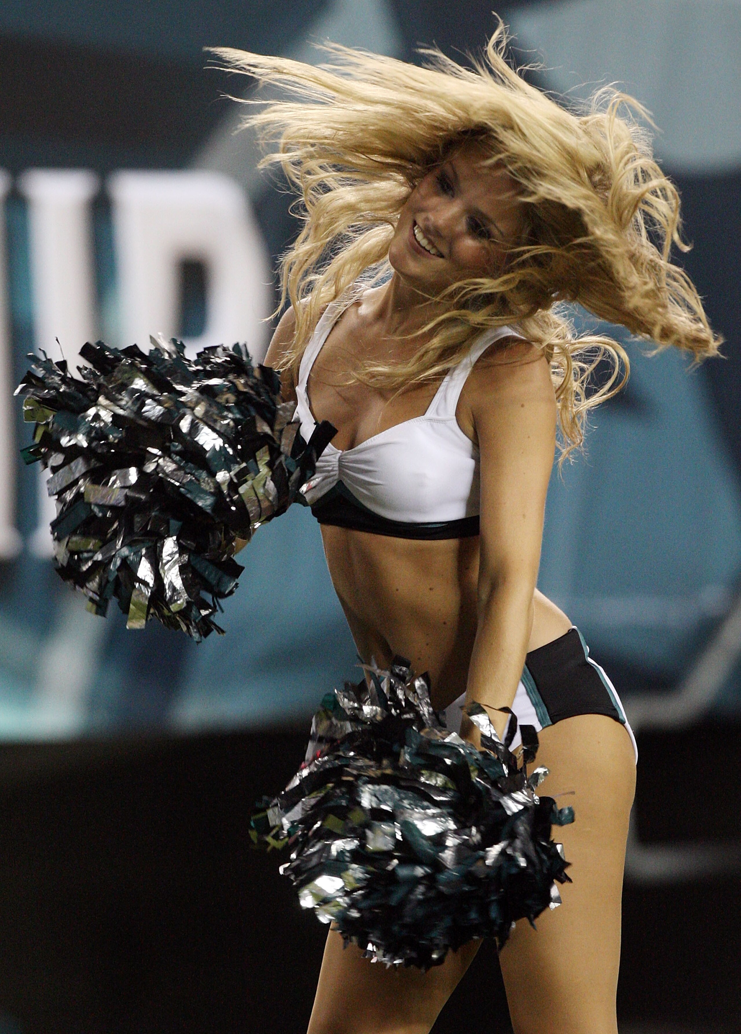 PHILADELPHIA - AUGUST 13:  A Philadelphia Eagles cheerleader performs during the game against the New England Patriots on August 13, 2009 at Lincoln Financial Field in Philadelphia, Pennsylvania.  (Photo by Jim McIsaac/Getty Images)