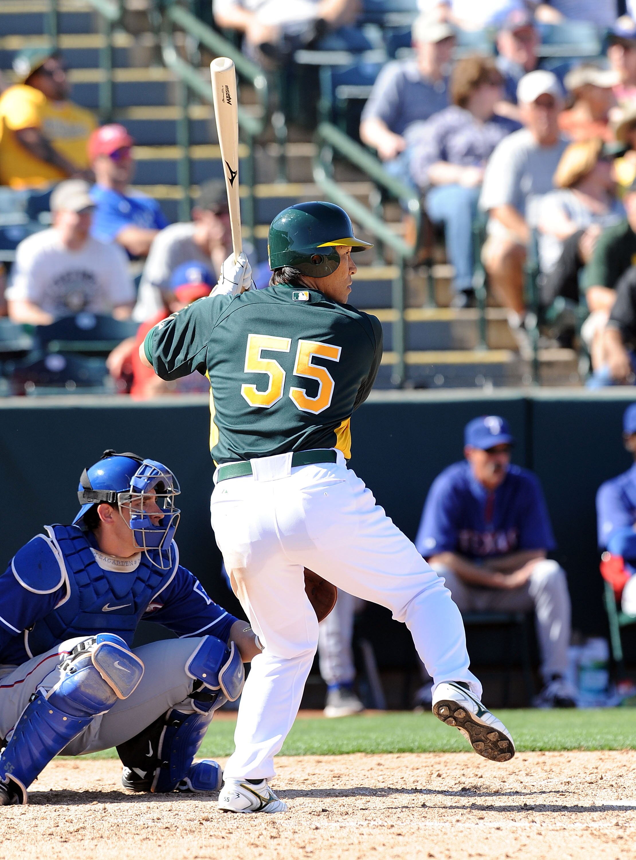 PHOENIX, AZ - MARCH 04:  Hideki Matsui #55 of the Oakland Athletics gets ready in the batters box against the Texas Rangers at Phoenix Municipal Stadium on March 4, 2011 in Phoenix, Arizona.  (Photo by Norm Hall/Getty Images)