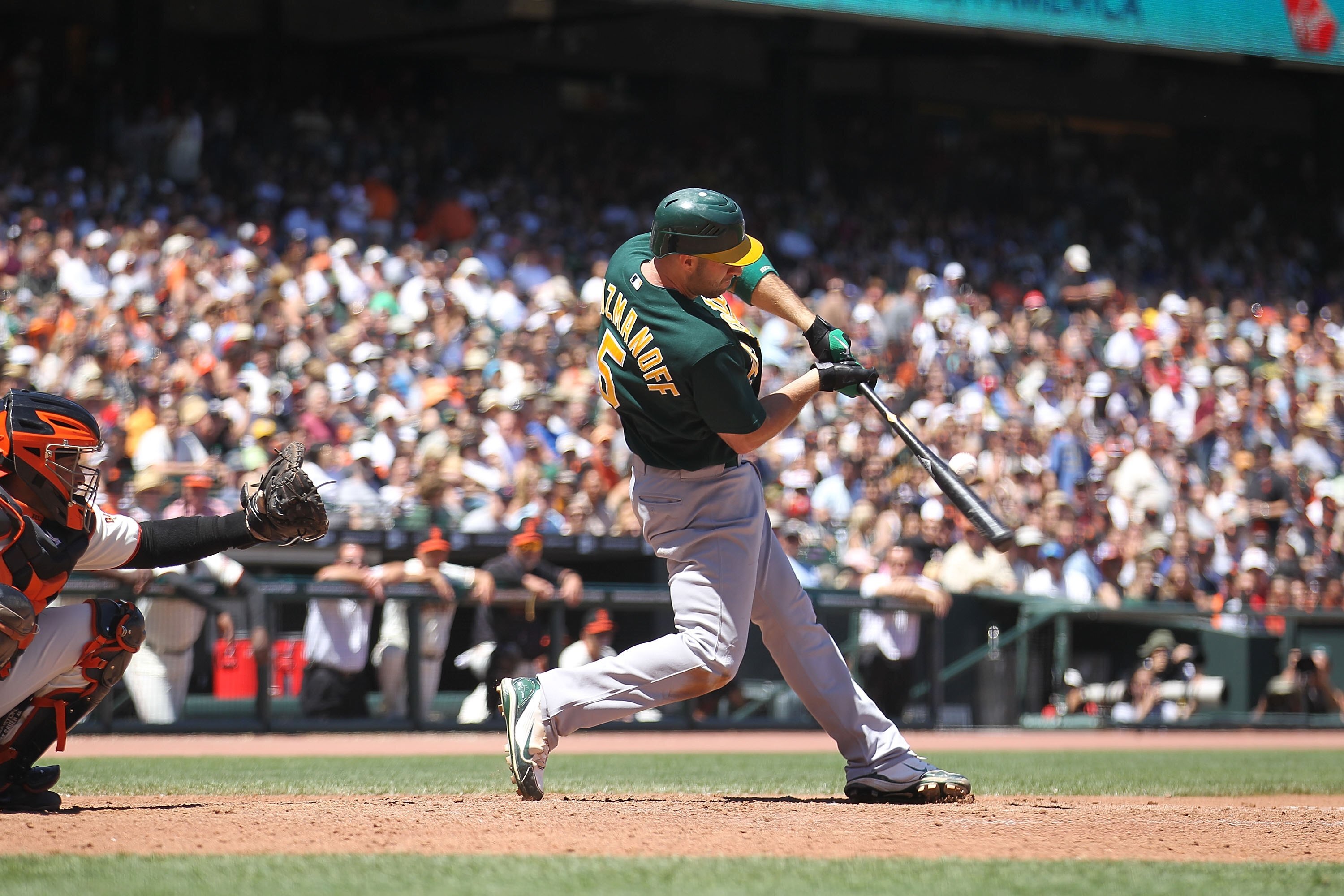 SAN FRANCISCO - JUNE 13:  Kevin Kouzmanoff #5 of the Oakland Athletics bats against the San Francisco Giants during an MLB game at AT&T Park on June 13, 2010 in San Francisco, California.  (Photo by Jed Jacobsohn/Getty Images)