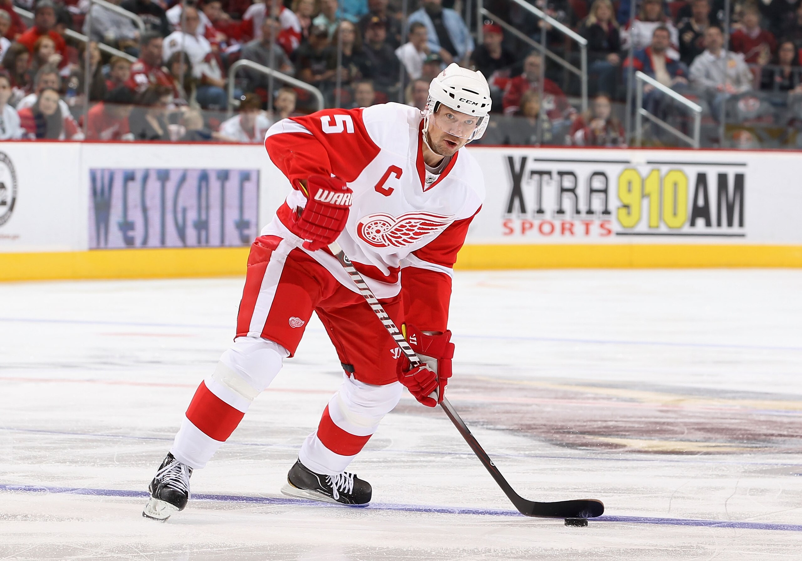 GLENDALE, AZ - MARCH 05:  Nicklas Lidstrom #5 of the Detroit Red Wings skates with the puck during the NHL game against the Phoenix Coyotes at Jobing.com Arena on March 5, 2011 in Glendale, Arizona. The Coyotes defeated the Red Wings 5-4 in an overtime sh