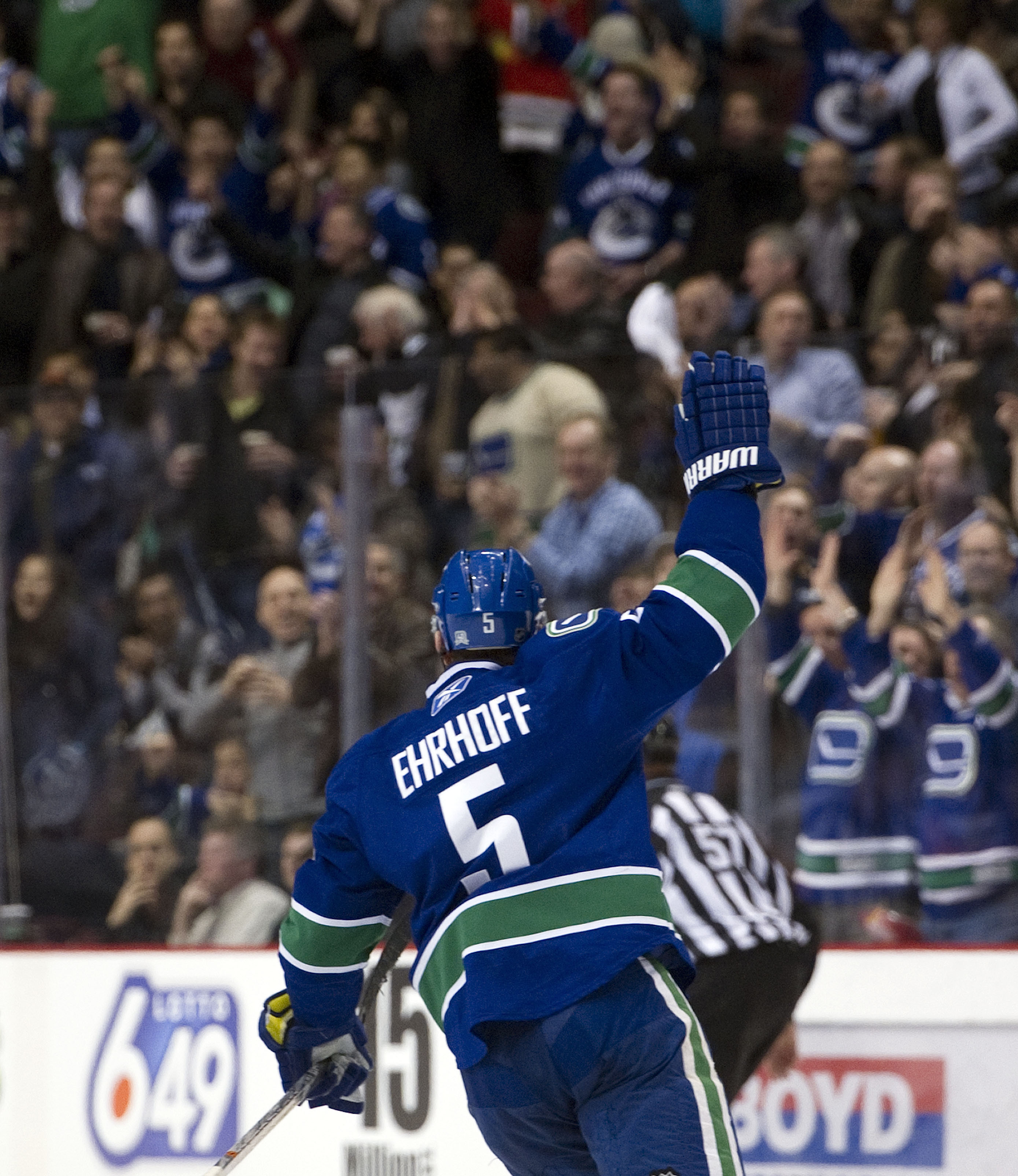 VANCOUVER, CANADA - FEBRUARY 4: Christian Ehrhoff #5 of the Vancouver Canucks celebrates after scoring against the Chicago Blackhawks during the first period in NHL action on February 04, 2011 at Rogers Arena in Vancouver, British Columbia, Canada. (Photo