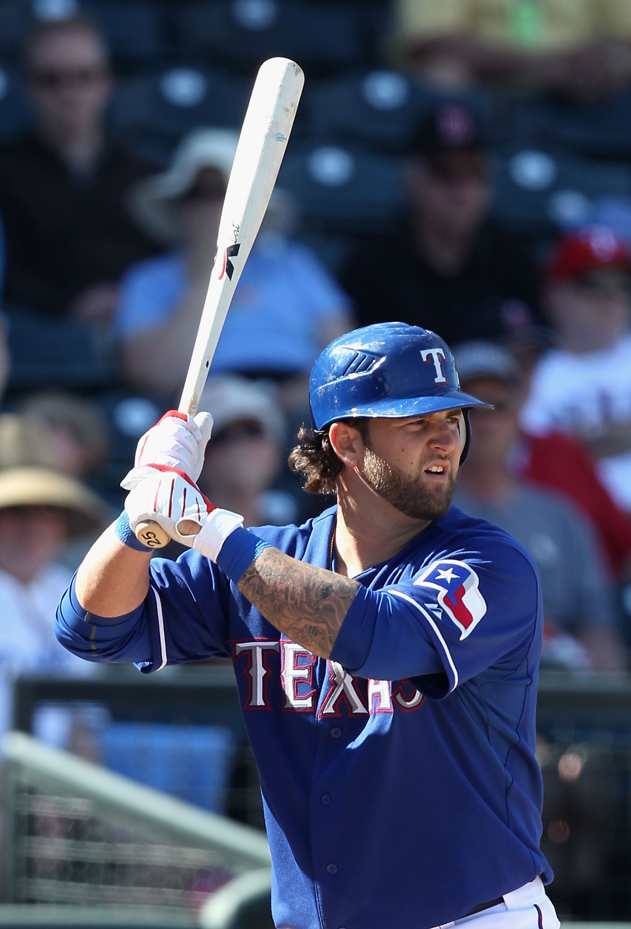 SURPRISE, AZ - MARCH 02:  Mike Napoli #25 of the Texas Rangers bats against the Los Angeles Angels of Anaheim during the spring training game at Surprise Stadium on March 2, 2011 in Surprise, Arizona.  (Photo by Christian Petersen/Getty Images)