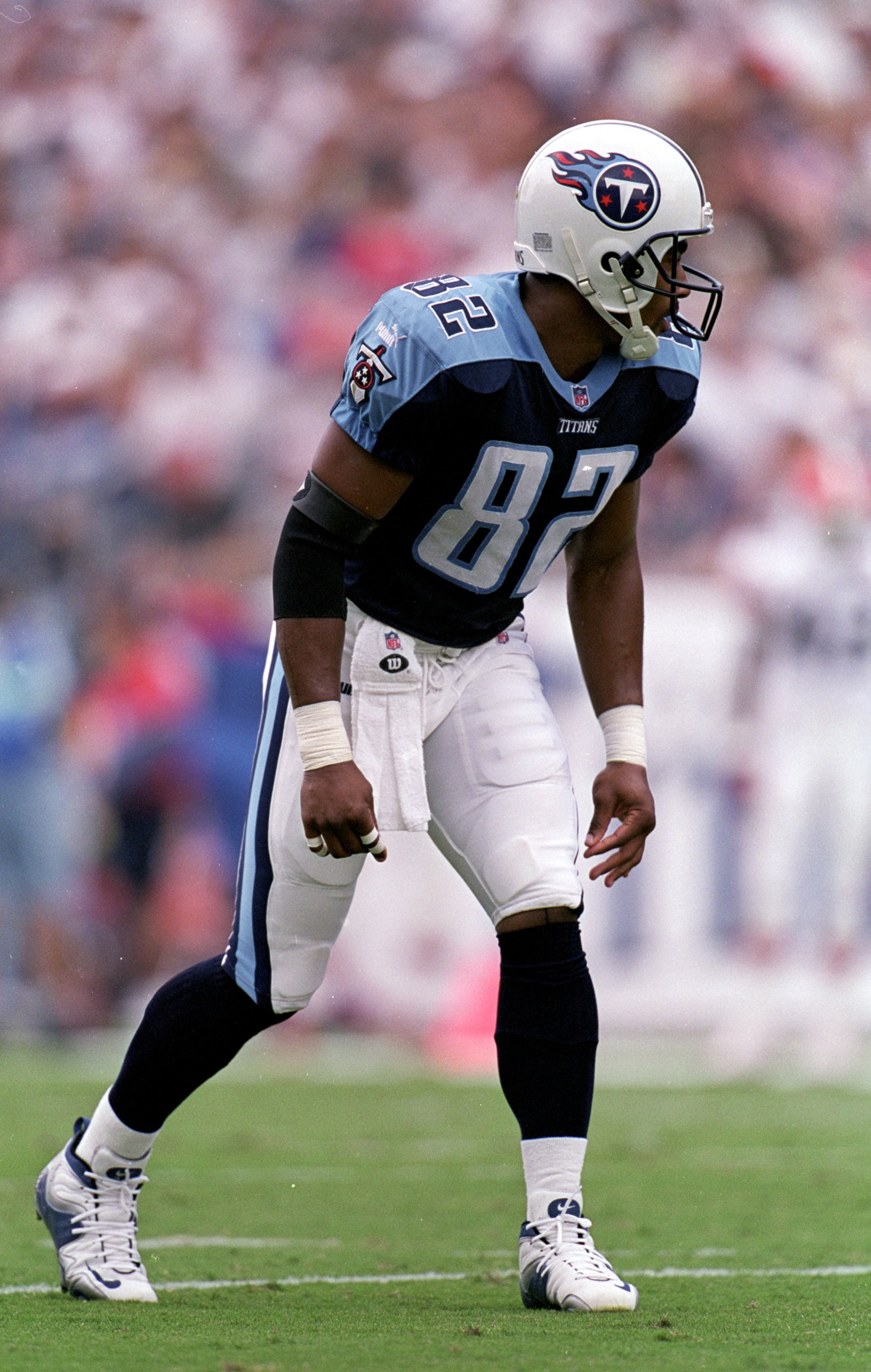 19 Sep 1999: Yancey Thigpen #82 of the Tennessee Titans gets ready to run during the game against the Ceveland Browns at the Adelphia Coliseum in Nashville, Tennessee. The Titans defeated the Browns 26-9. Mandatory Credit: Brian Bahr /Allsport 19 Sep 1999: Yancey Thigpen #82 of the Tennessee Titans gets ready to run during the game against the Ceveland Browns at the Adelphia Coliseum in Nashville, Tennessee. The Titans defeated the Browns 26-9. Mandatory Credit: Brian Bahr /Allsport