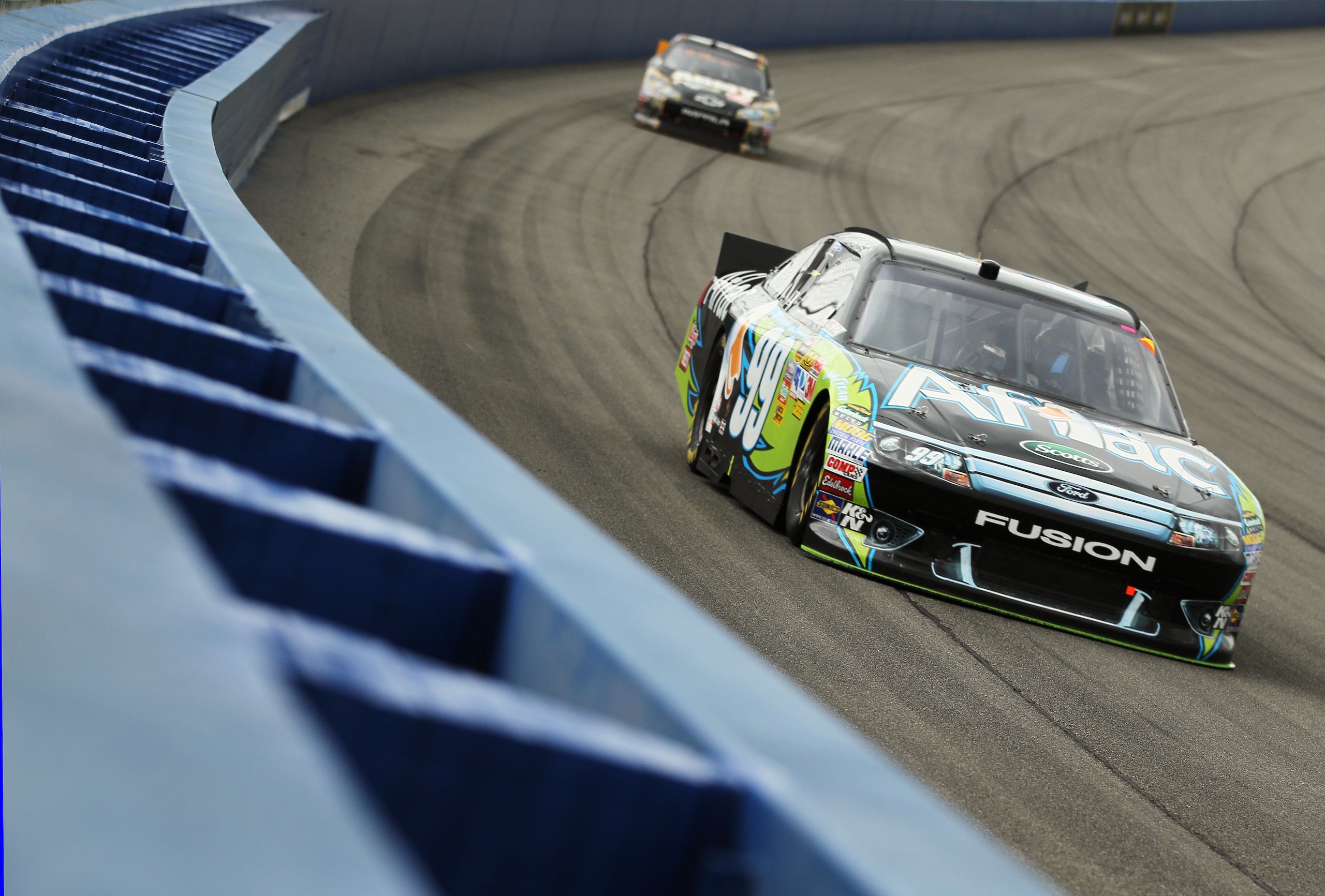FONTANA, CA - MARCH 27: Carl Edwards, driver of the #99 Aflac Ford, races during the NASCAR Sprint Cup Series Auto Club 400 at Auto Club Speedway on March 27, 2011 in Fontana, California. (Photo by Jeff Gross/Getty Images) FONTANA, CA - MARCH 27: Carl Edwards, driver of the #99 Aflac Ford, races during the NASCAR Sprint Cup Series Auto Club 400 at Auto Club Speedway on March 27, 2011 in Fontana, California. (Photo by Jeff Gross/Getty Images)