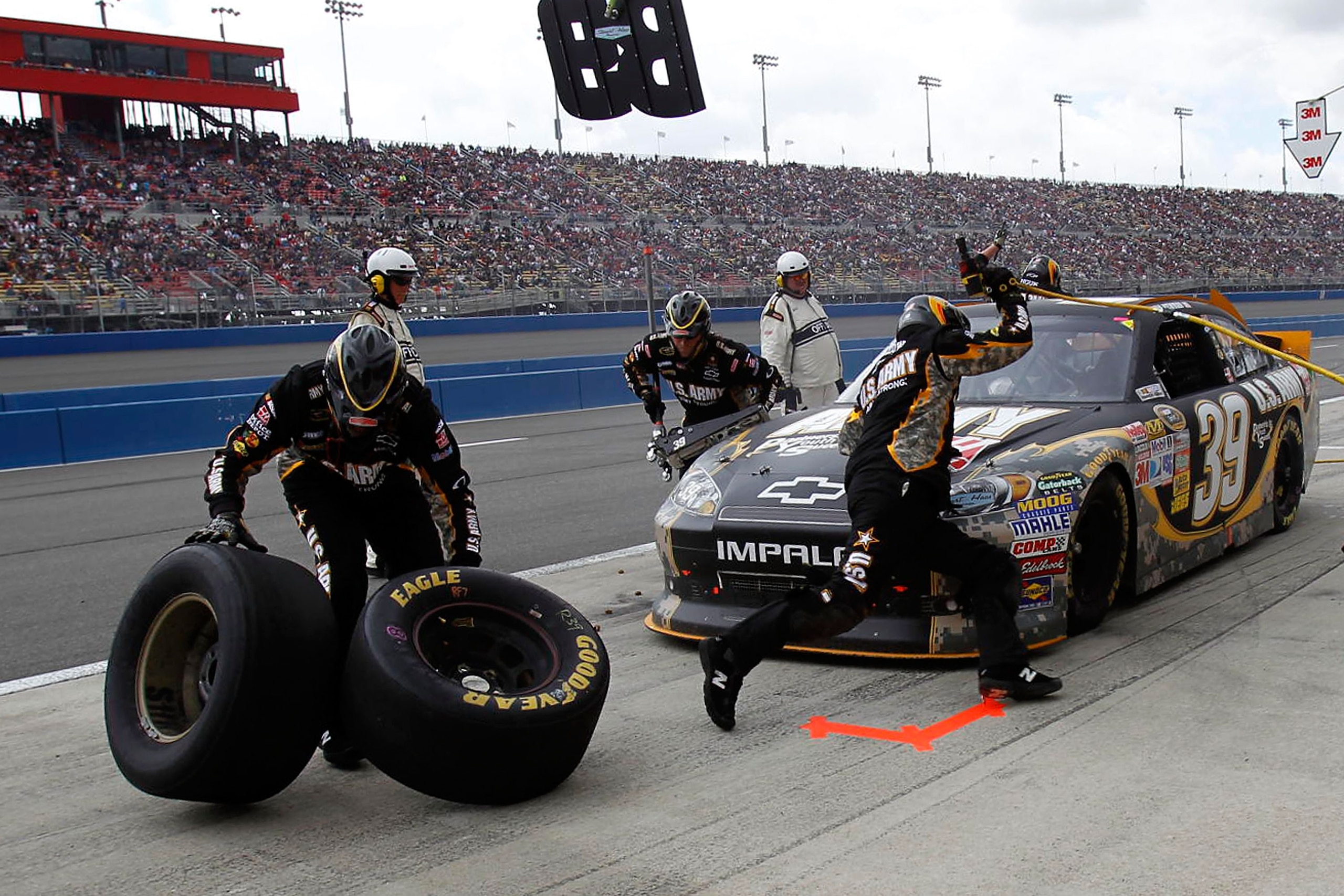 FONTANA, CA - MARCH 27: Ryan Newman, driver of the #39 U.S. Army Chevrolet, makes a pit stop during the NASCAR Sprint Cup Series Auto Club 400 at Auto Club Speedway on March 27, 2011 in Fontana, California. (Photo by Todd Warshaw/Getty Images for NASCAR FONTANA, CA - MARCH 27: Ryan Newman, driver of the #39 U.S. Army Chevrolet, makes a pit stop during the NASCAR Sprint Cup Series Auto Club 400 at Auto Club Speedway on March 27, 2011 in Fontana, California. (Photo by Todd Warshaw/Getty Images for NASCAR