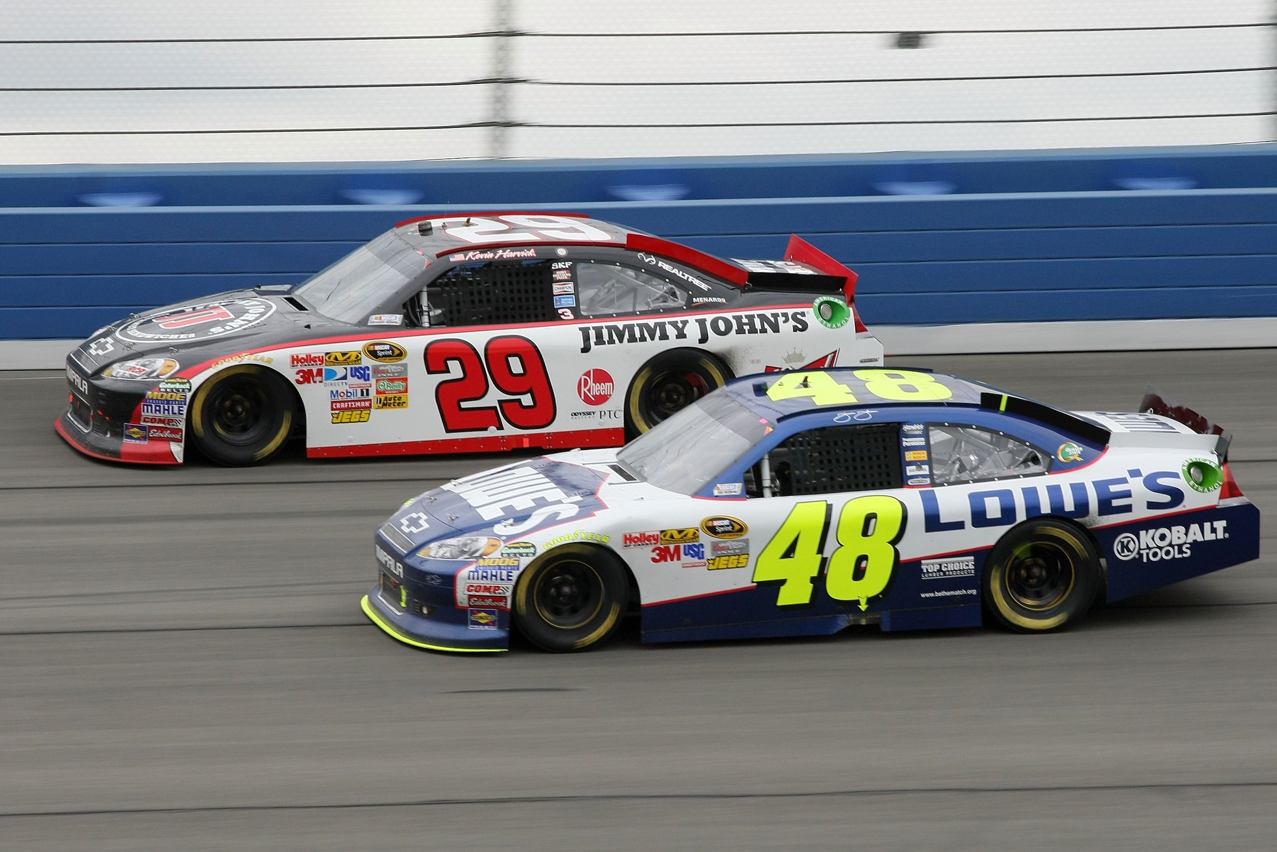 FONTANA, CA - MARCH 27: Kevin Harvick, driver of the #29 Jimmy John's Chevrolet, passes Jimmie Johnson, driver of the #48 Lowe's Chevrolet, on the last lap of the NASCAR Sprint Cup Series Auto Club 400 at Auto Club Speedway on March 27, 2011 in Fontana, FONTANA, CA - MARCH 27: Kevin Harvick, driver of the #29 Jimmy John's Chevrolet, passes Jimmie Johnson, driver of the #48 Lowe's Chevrolet, on the last lap of the NASCAR Sprint Cup Series Auto Club 400 at Auto Club Speedway on March 27, 2011 in Fontana,