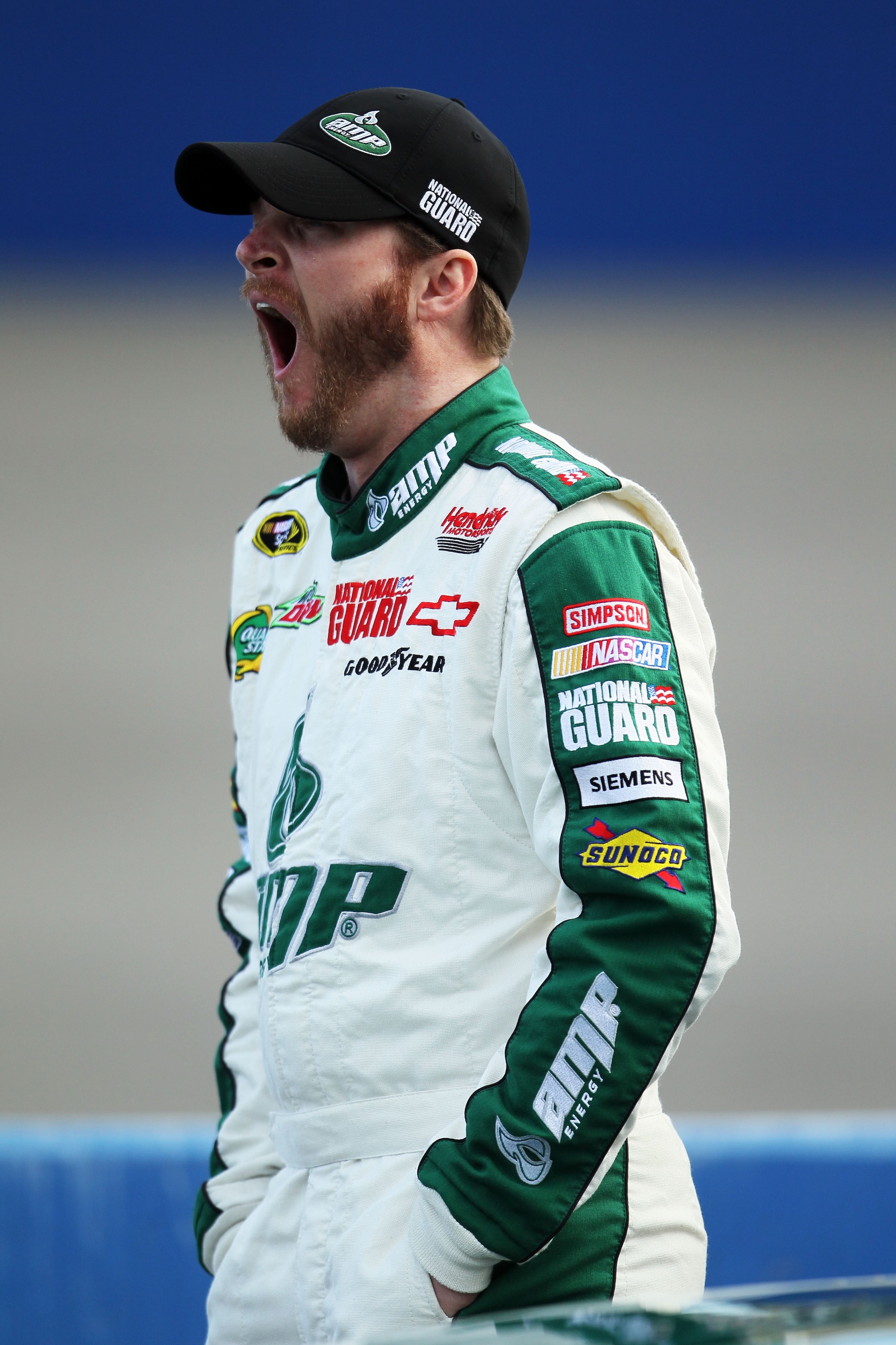 FONTANA, CA - MARCH 25: Dale Earnhardt Jr., driver of the #88 AMP Energy/National Guard Chevrolet, stands on pit road during qualifying for the NASCAR Sprint Cup Series Auto Club 400 at Auto Club Speedway on March 25, 2011 in Fontana, California. (Photo FONTANA, CA - MARCH 25: Dale Earnhardt Jr., driver of the #88 AMP Energy/National Guard Chevrolet, stands on pit road during qualifying for the NASCAR Sprint Cup Series Auto Club 400 at Auto Club Speedway on March 25, 2011 in Fontana, California. (Photo