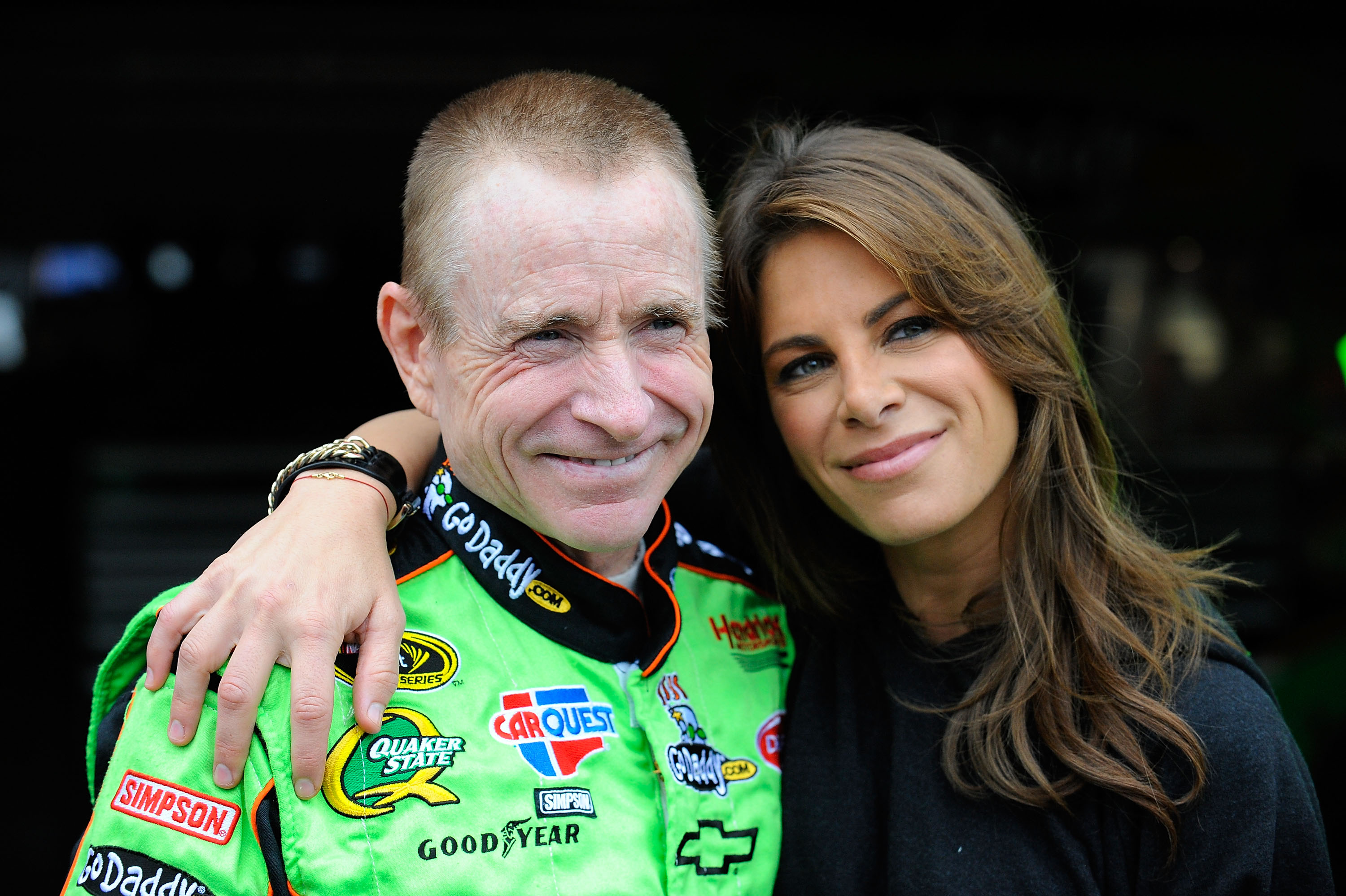 FONTANA, CA - MARCH 25:  Mark Martin, driver of the #5 GoDaddy.com Chevrolet, poses with celebrity fitness trainer Jillian Michaels prior to practice for the NASCAR Sprint Cup Series Auto Club 400 at Auto Club Speedway on March 25, 2011 in Fontana, Califo