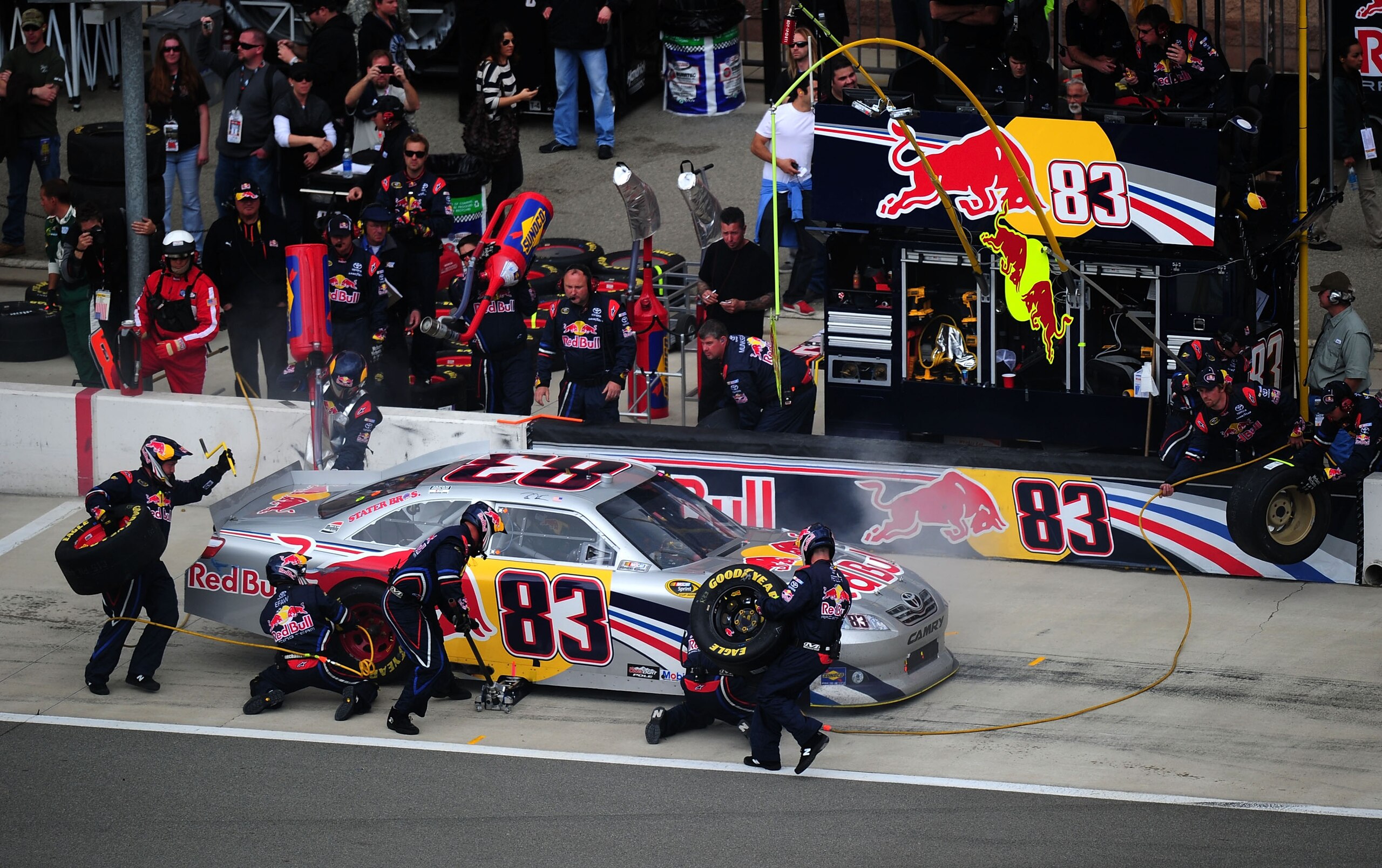 FONTANA, CA - MARCH 27: Brian Vickers, driver of the #83 Red Bull Toyota, makes a pit stop during the NASCAR Sprint Cup Series Auto Club 400 at Auto Club Speedway on March 27, 2011 in Fontana, California. (Photo by Robert Laberge/Getty Images for NASCAR FONTANA, CA - MARCH 27: Brian Vickers, driver of the #83 Red Bull Toyota, makes a pit stop during the NASCAR Sprint Cup Series Auto Club 400 at Auto Club Speedway on March 27, 2011 in Fontana, California. (Photo by Robert Laberge/Getty Images for NASCAR