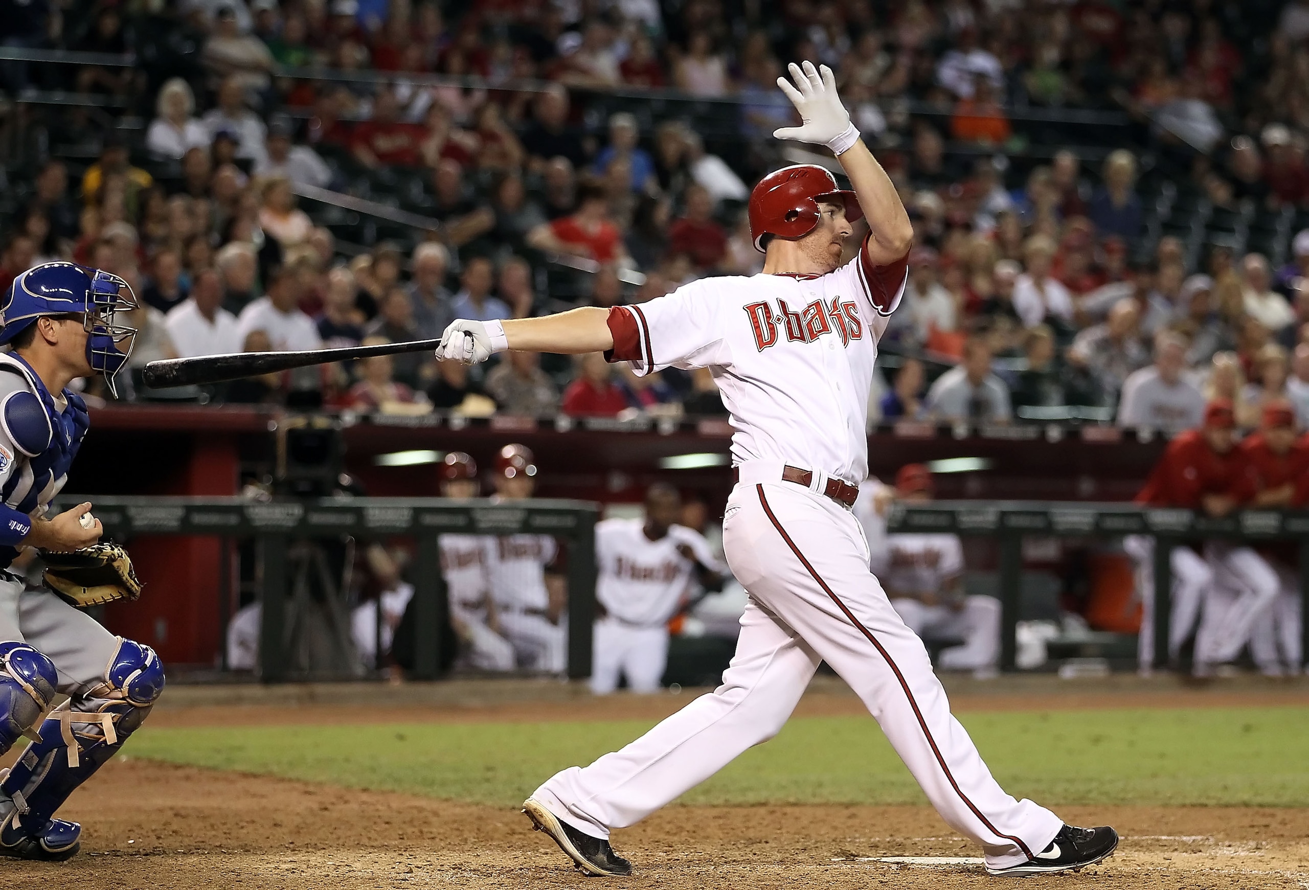 PHOENIX - SEPTEMBER 24:  Adam LaRoche #25 of the Arizona Diamondbacks bats against the Los Angeles Dodgers during the Major League Baseball game at Chase Field on September 24, 2010 in Phoenix, Arizona.  (Photo by Christian Petersen/Getty Images)