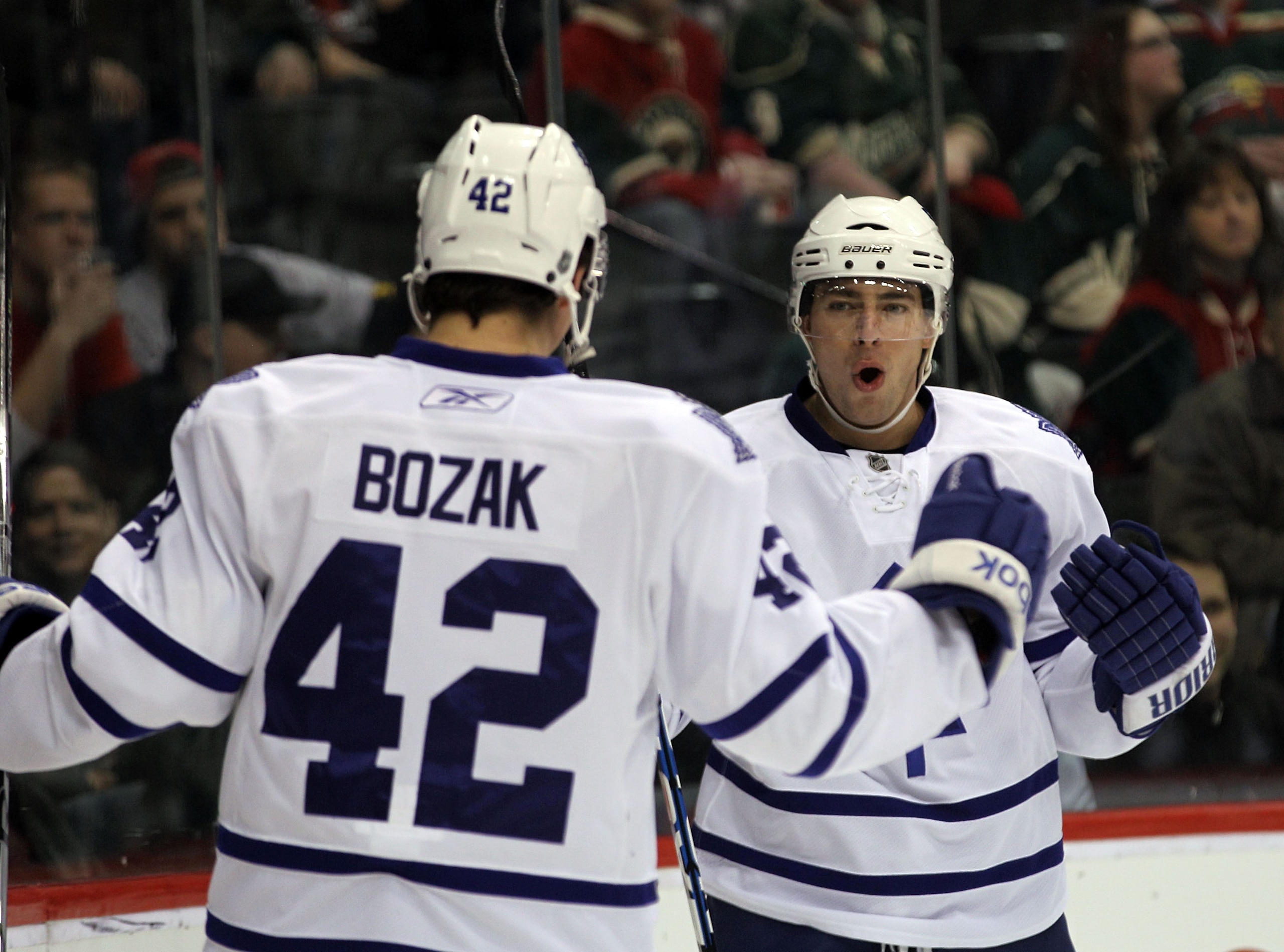 ST PAUL, MN - MARCH 22: Tyler Bozak #42 of the Toronto Maple Leafs congratulates Joffrey Lupul #19 on his first period goal against the Minnesota Wild  at the Xcel Energy Center on March 22, 2011 in St Paul, Minnesota. (Photo by Bruce Bennett/Getty Images