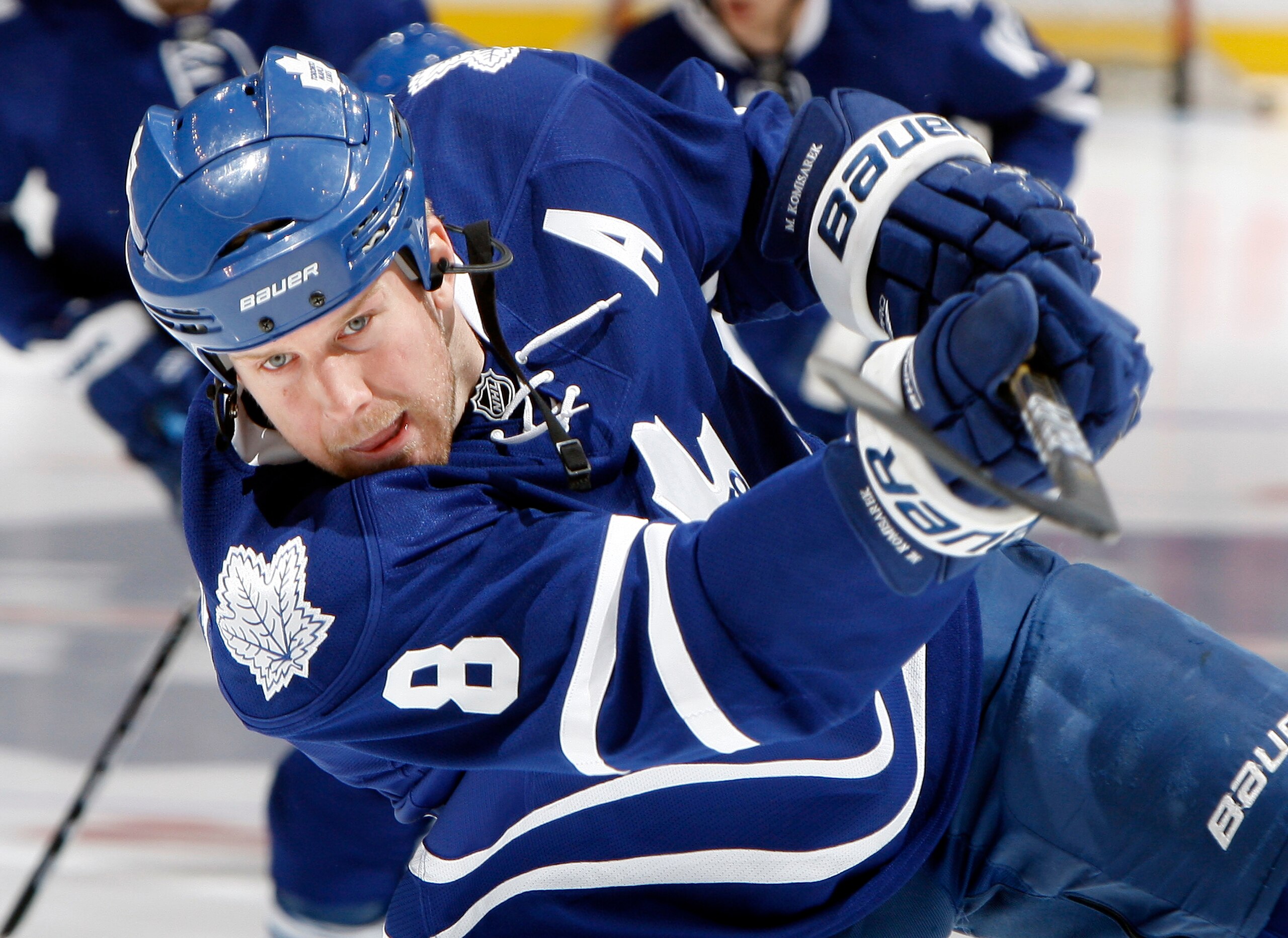 TORONTO, CANADA - MARCH 2:  Mike Komisarek #8 of the Toronto Maple Leafs shoots during warm-up before game action against the Pittsburgh Penguins at the Air Canada Centre March 2, 2011 in Toronto, Ontario, Canada. (Photo by Abelimages/Getty Images)