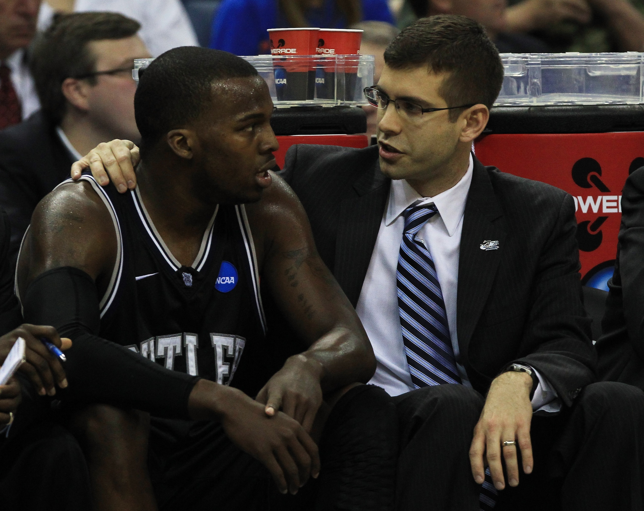 NEW ORLEANS, LA - MARCH 26:  Shelvin Mack #1 of the Butler Bulldogs talks to head coach Brad Stevens during their 74 to 71 win over the Florida Gators during the Southeast regional final of the 2011 NCAA men's basketball tournament at New Orleans Arena on