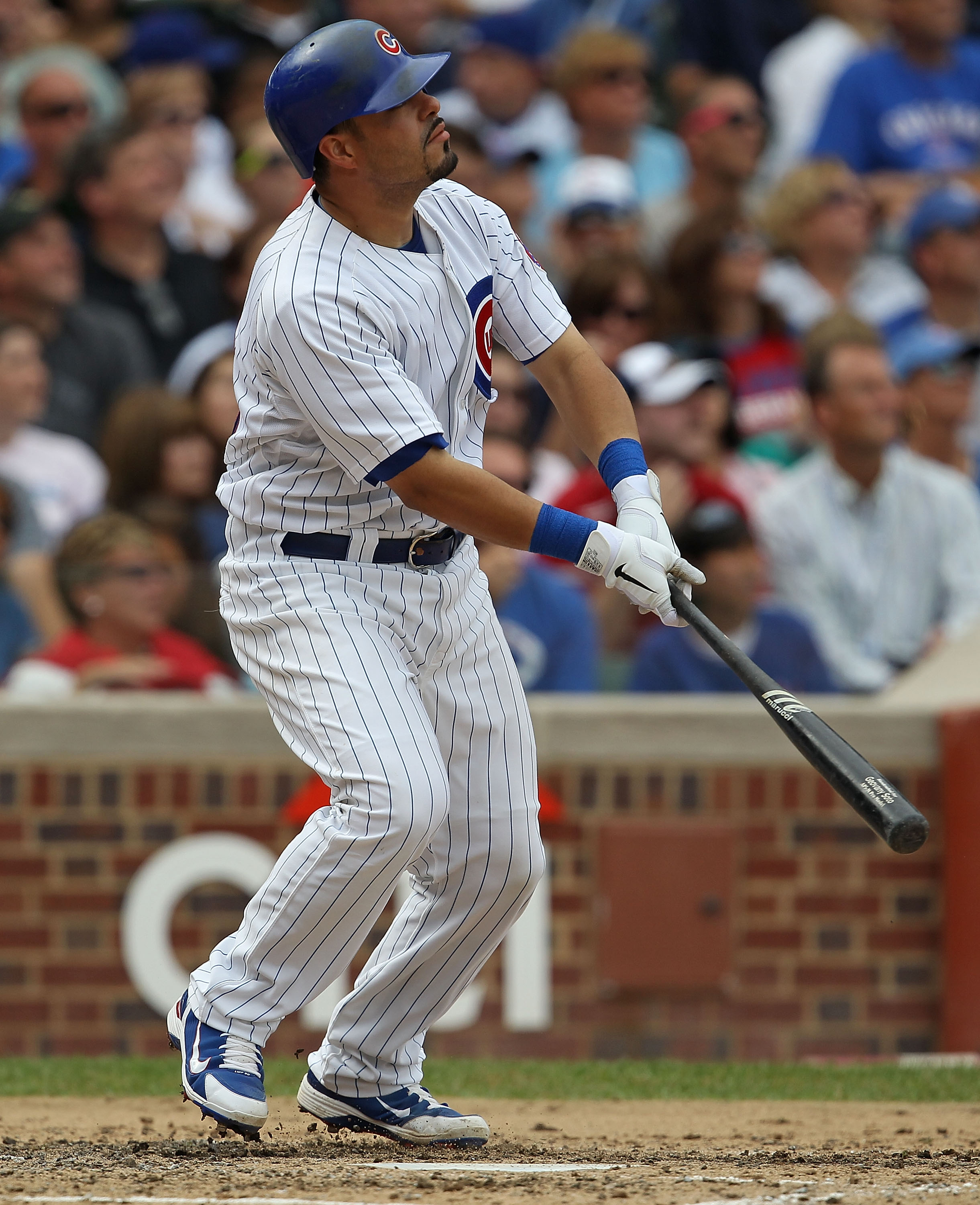 CHICAGO - SEPTEMBER 05: Geovany Soto #18 of the Chicago Cubs watches the flight of the ball against the New York Mets at Wrigley Field on September 5, 2010 in Chicago, Illinois. The Mets defeated the Cubs 18-5. (Photo by Jonathan Daniel/Getty Images)