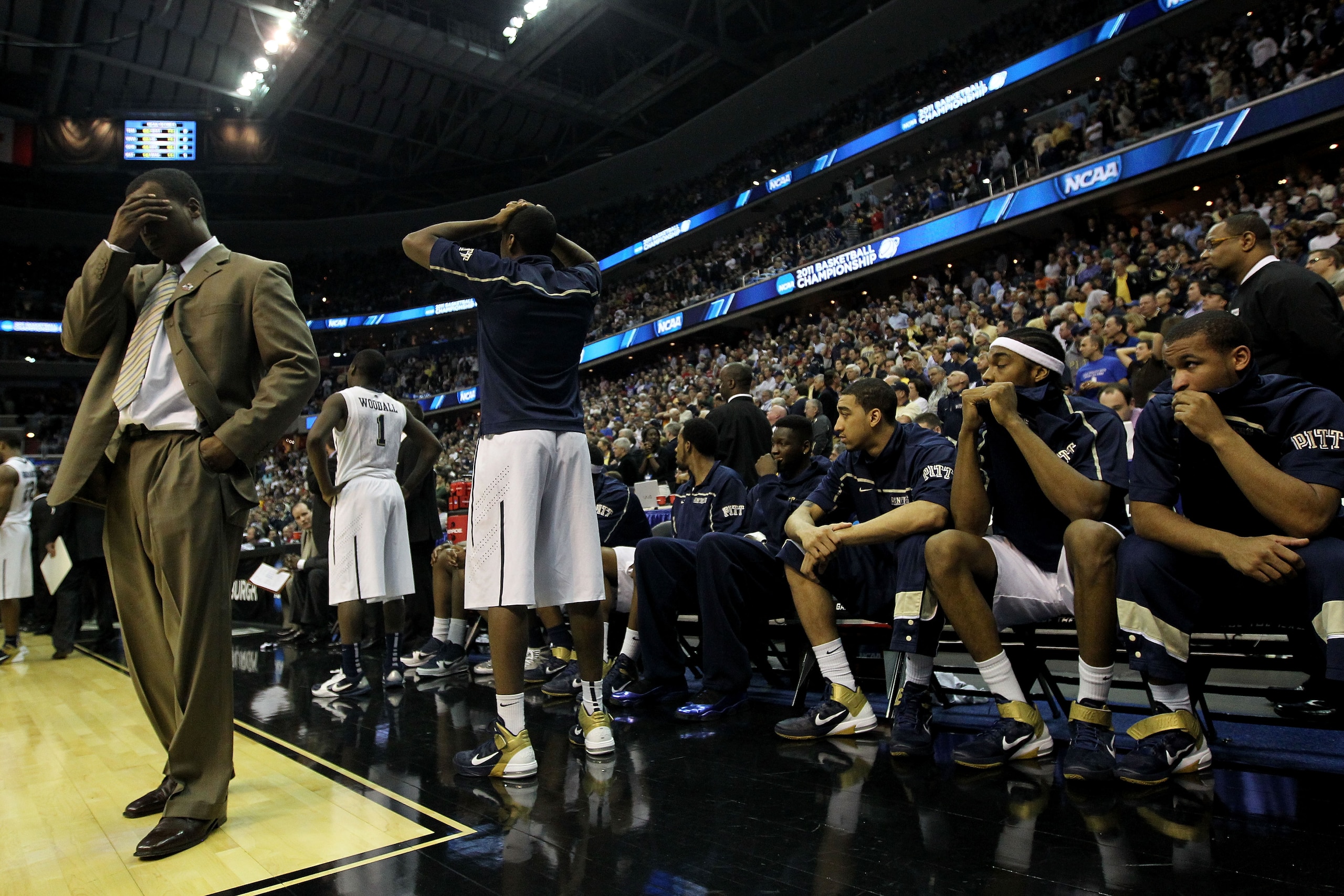 WASHINGTON - MARCH 19:  The Pittsburgh Panthers react to their loss to the Butler Bulldogs during the third round of the 2011 NCAA men's basketball tournament at Verizon Center on March 19, 2011 in Washington, DC.  (Photo by Nick Laham/Getty Images)
