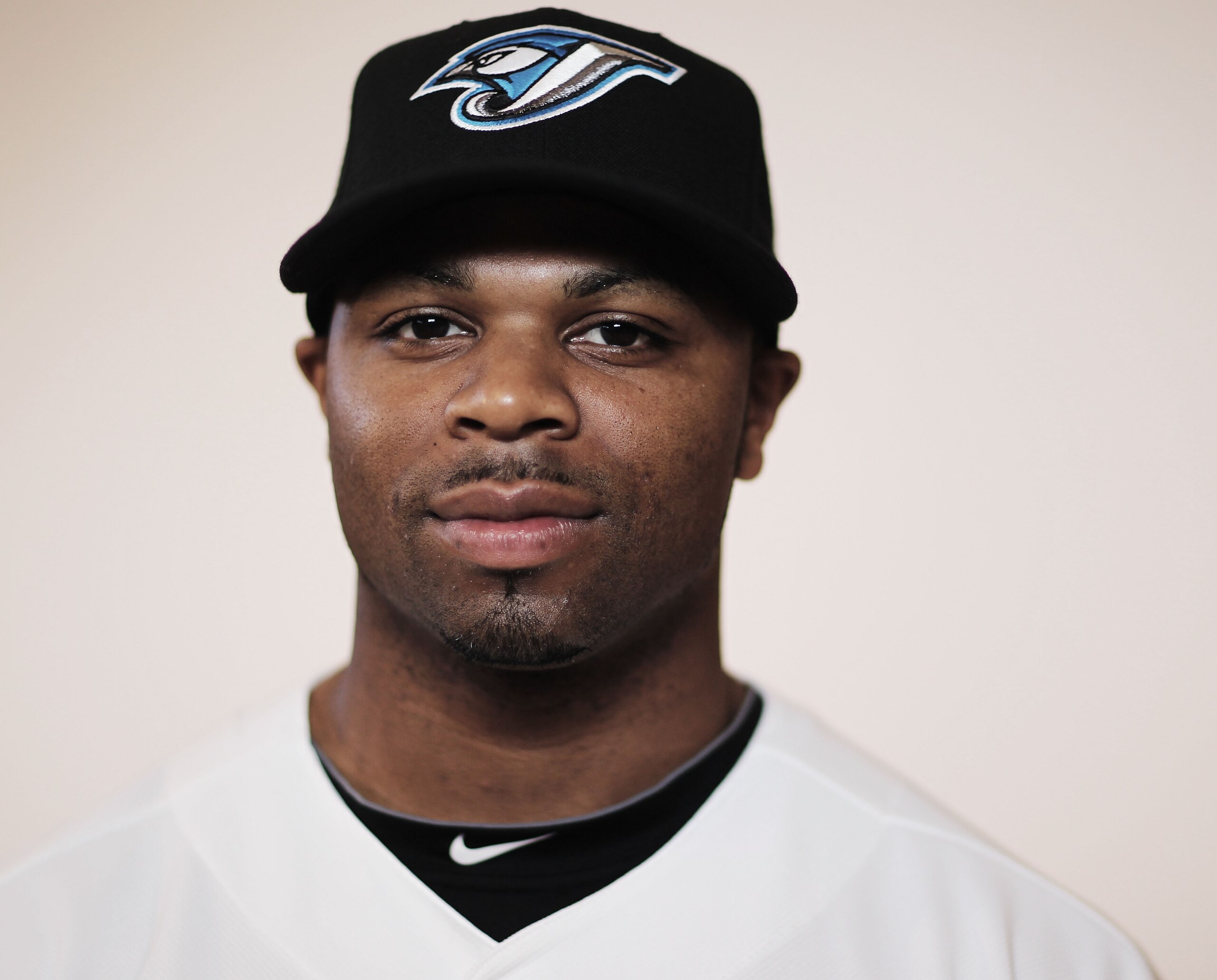 DUNEDIN, FL - FEBRUARY 20:  (EDITORS NOTE : THIS IMAGE HAS BEEN DIGITALLY DESATURATED). Rajai Davis #11 of the Toronto Blue Jays poses during photo day at Florida Auto Exchange Stadium on February 20, 2011 in Dunedin, Florida.  (Photo by Nick Laham/Getty