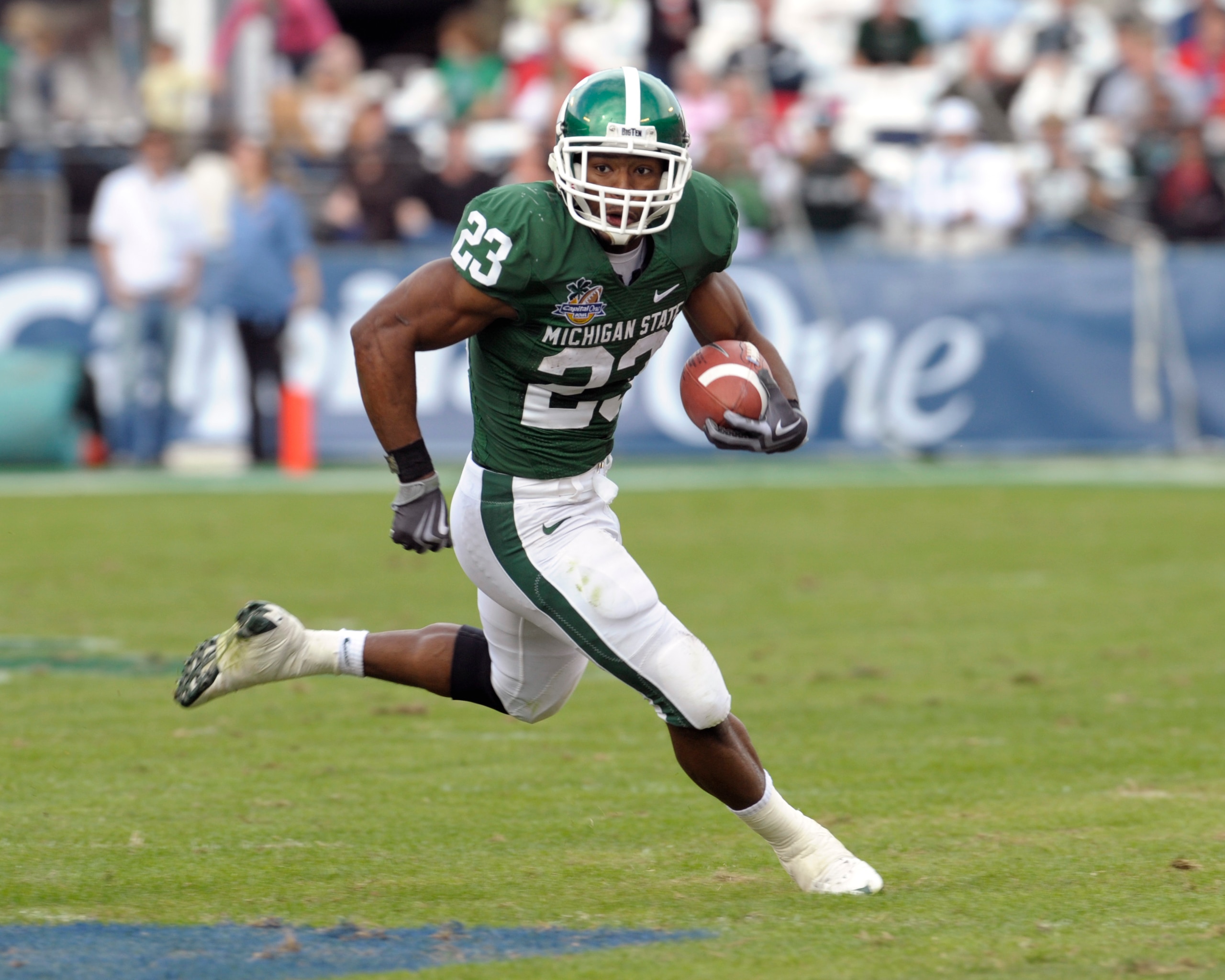 ORLANDO, FL - JANUARY 1: Running back Javon Ringer #23 of the Michigan State Spartans rushes upfield against the Georgia Bulldogs during the 2009 Capital One Bowl at the Citrus Bowl on January 1, 2009 in Orlando, Florida.  (Photo by Al Messerschmidt/Getty