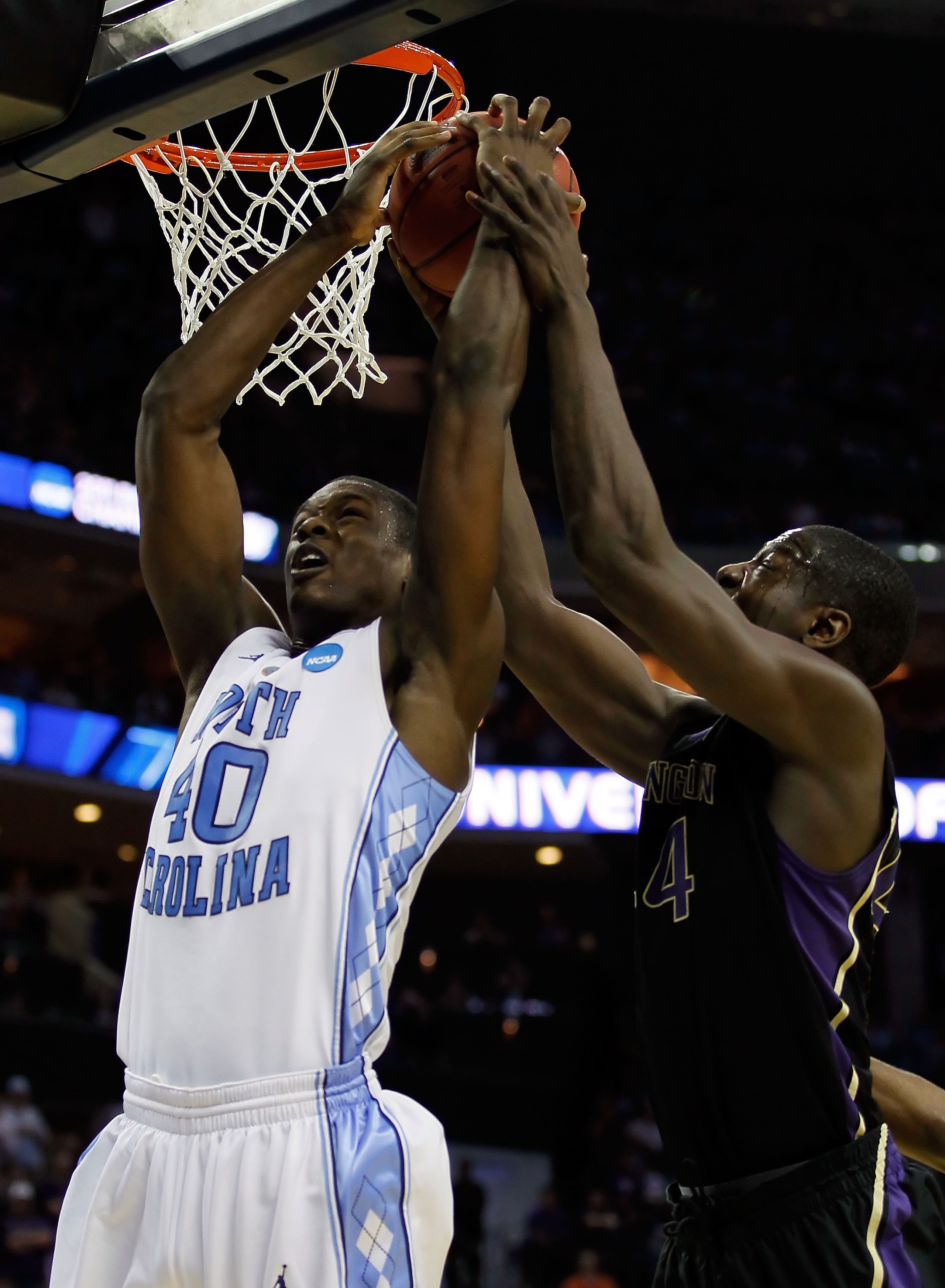 CHARLOTTE, NC - MARCH 20: Harrison Barnes #40 of the North Carolina Tar Heels and Darnell Gant #44 of the Washington Huskies battle for a rebound in the second half during the third round of the 2011 NCAA men's basketball tournament at Time Warner Cable CHARLOTTE, NC - MARCH 20: Harrison Barnes #40 of the North Carolina Tar Heels and Darnell Gant #44 of the Washington Huskies battle for a rebound in the second half during the third round of the 2011 NCAA men's basketball tournament at Time Warner Cable