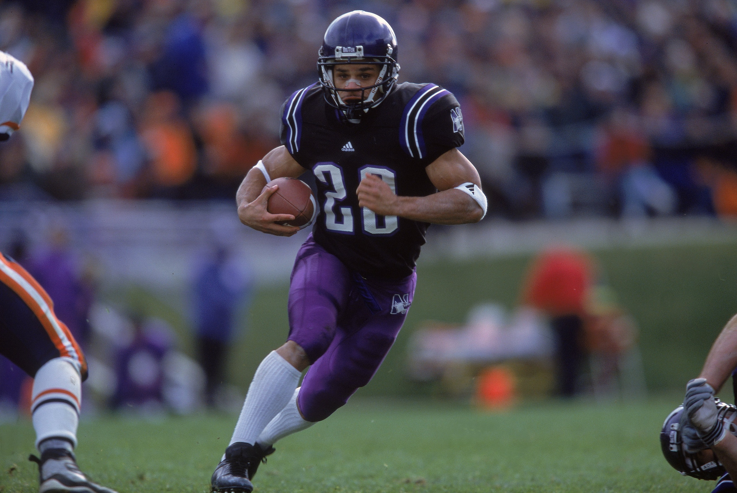 18 Nov 2000:  Damien Anderson #20 of the Northwestern Wildcats runs with the ball during the game against the Illinois Fighting Illini at Ryan Field in Evanston, Illinois. The Wildcats defeated the Fighting Illini 61-23.Mandatory Credit: Jamie Squire  /Al