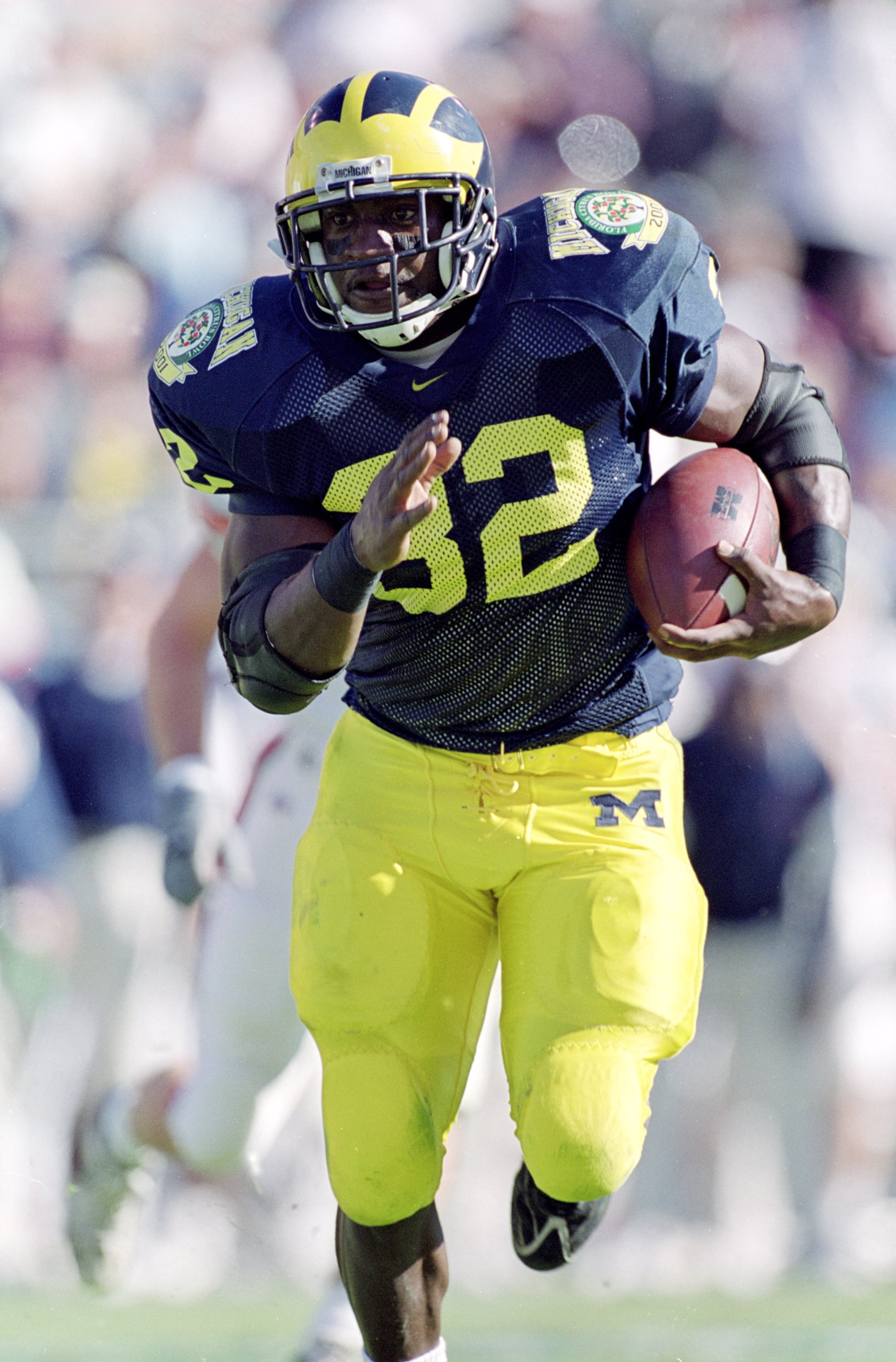 1 Jan 2001:   Anthony Thomas #32 of the Michigan Wolverines carries the ball up the field during the Citrus Bowl Game aganst the Auburn Tigers at the Citrus Bowl in Orlando, Florida.  The Wolverines defeated the Tiger 31-28.Mandatory Credit: Eliot J. Sche