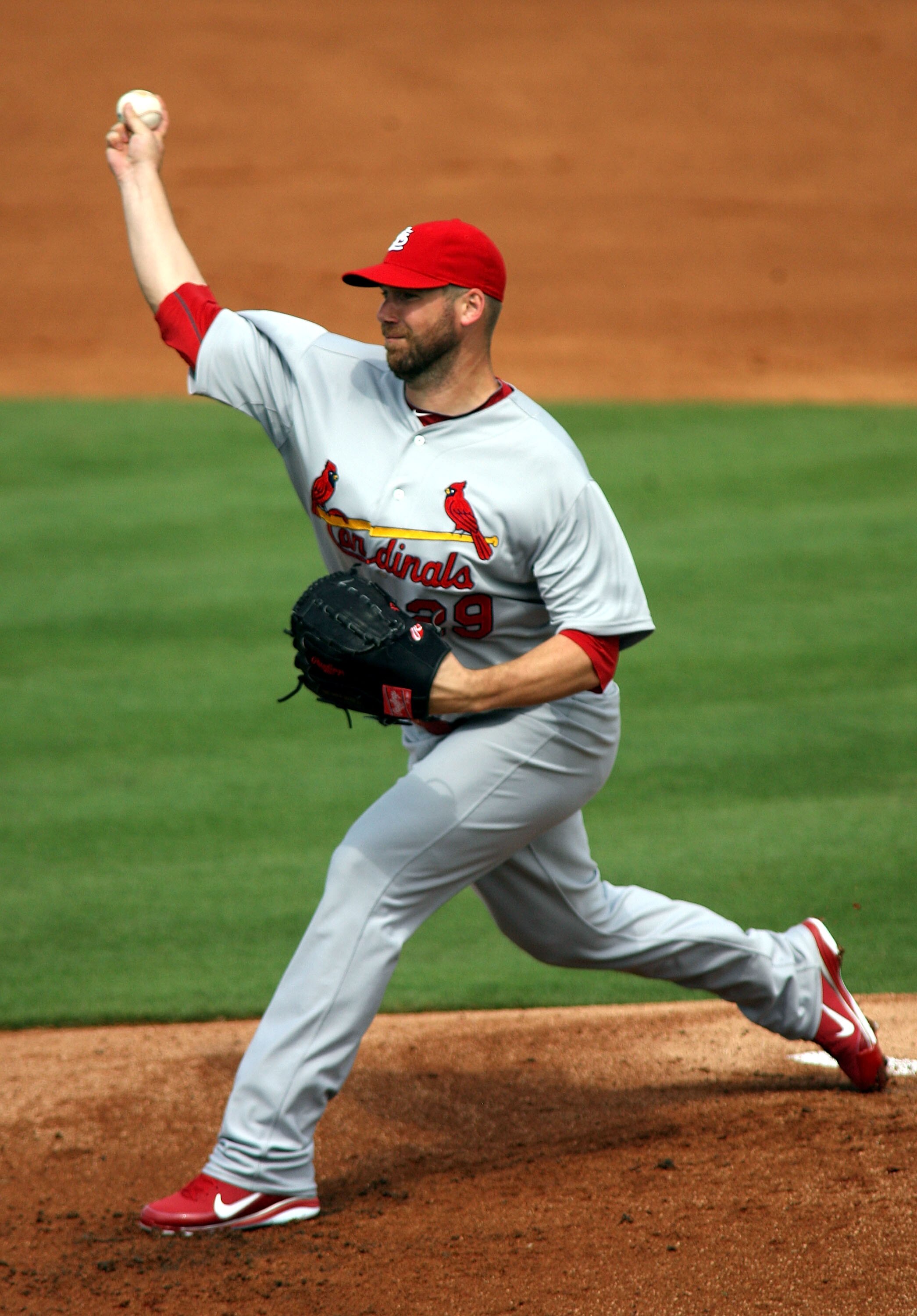 JUPITER, FL - MARCH 01:  Pitcher Chris Carpenter #29 of the St. Louis Cardinals throws against the Florida Marlins at Roger Dean Stadium on March 1, 2011 in Jupiter, Florida.  (Photo by Marc Serota/Getty Images)