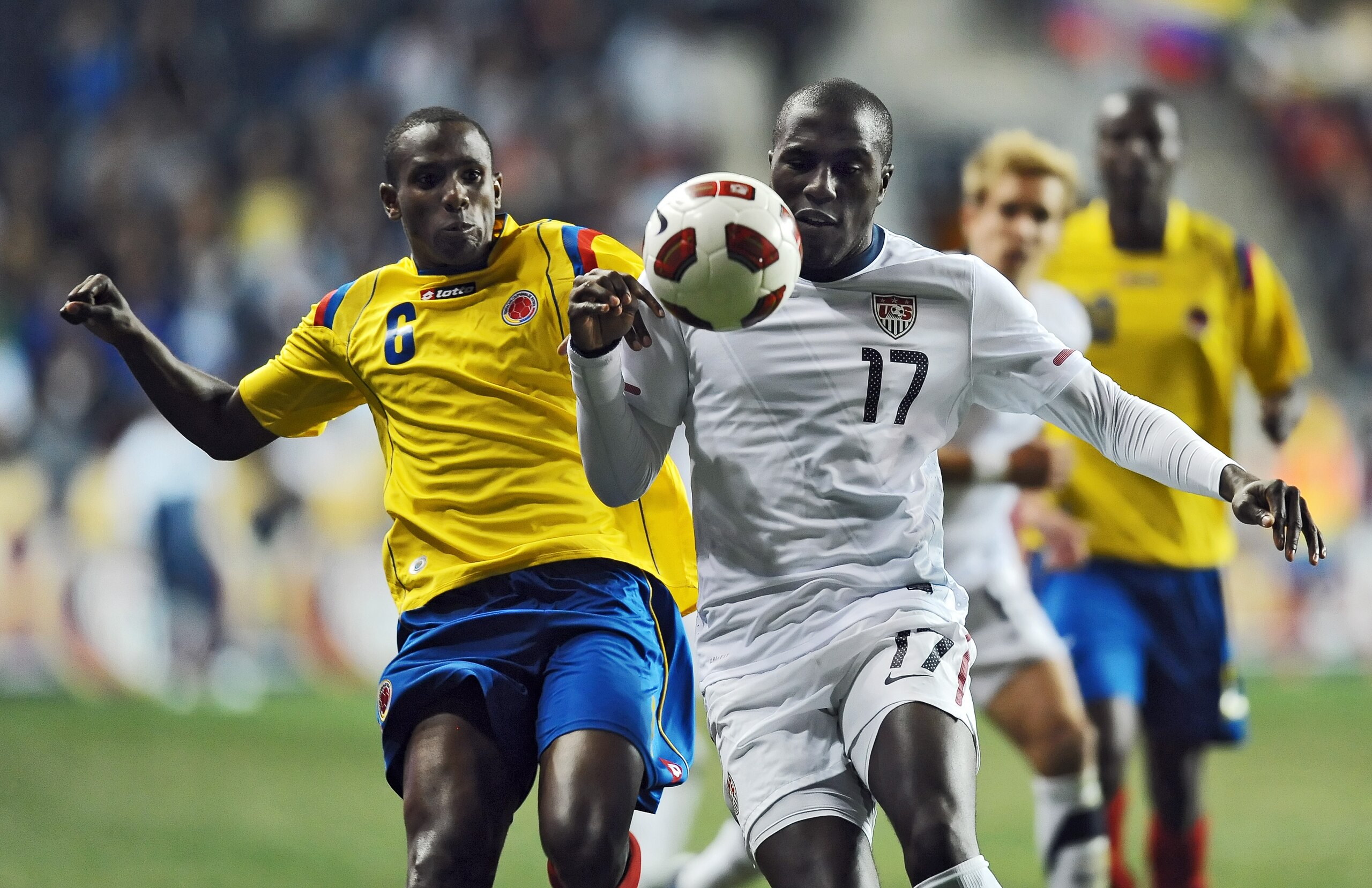 CHESTER, PA - OCTOBER 12: Jozy Altidore #17 of the United States and Juan David Valencia #6 of colombia chase down the ball at PPL Park on October 12, 2010 in Chester, Pennsylvania. The game ended in a 0-0 tie. (Photo by Drew Hallowell/Getty Images)