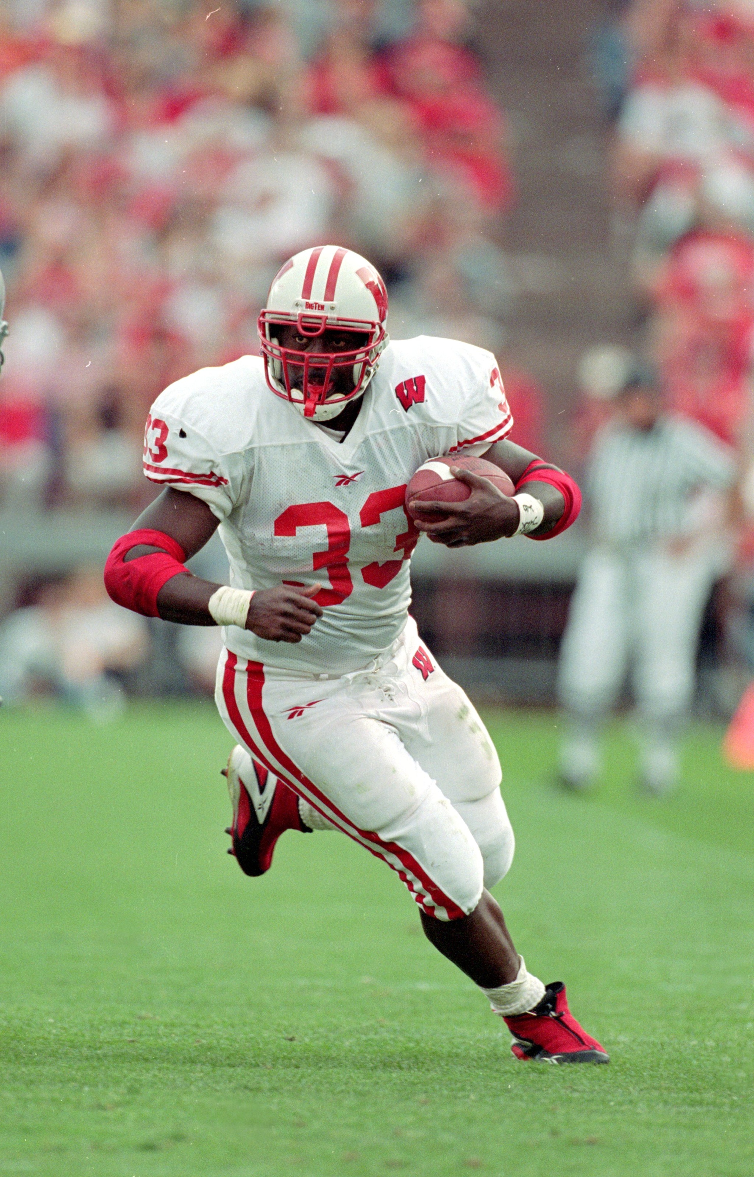 2 Oct 1999: Ron Dayne #33 of the Wisconsin Badgers carries the ball during the game against the Ohio State Buckeyes at the Ohio Stadium in Columbus, Ohio. The Badgers defeated the Buckeyes 42-17. Mandatory Credit: Tom Hauck  /Allsport