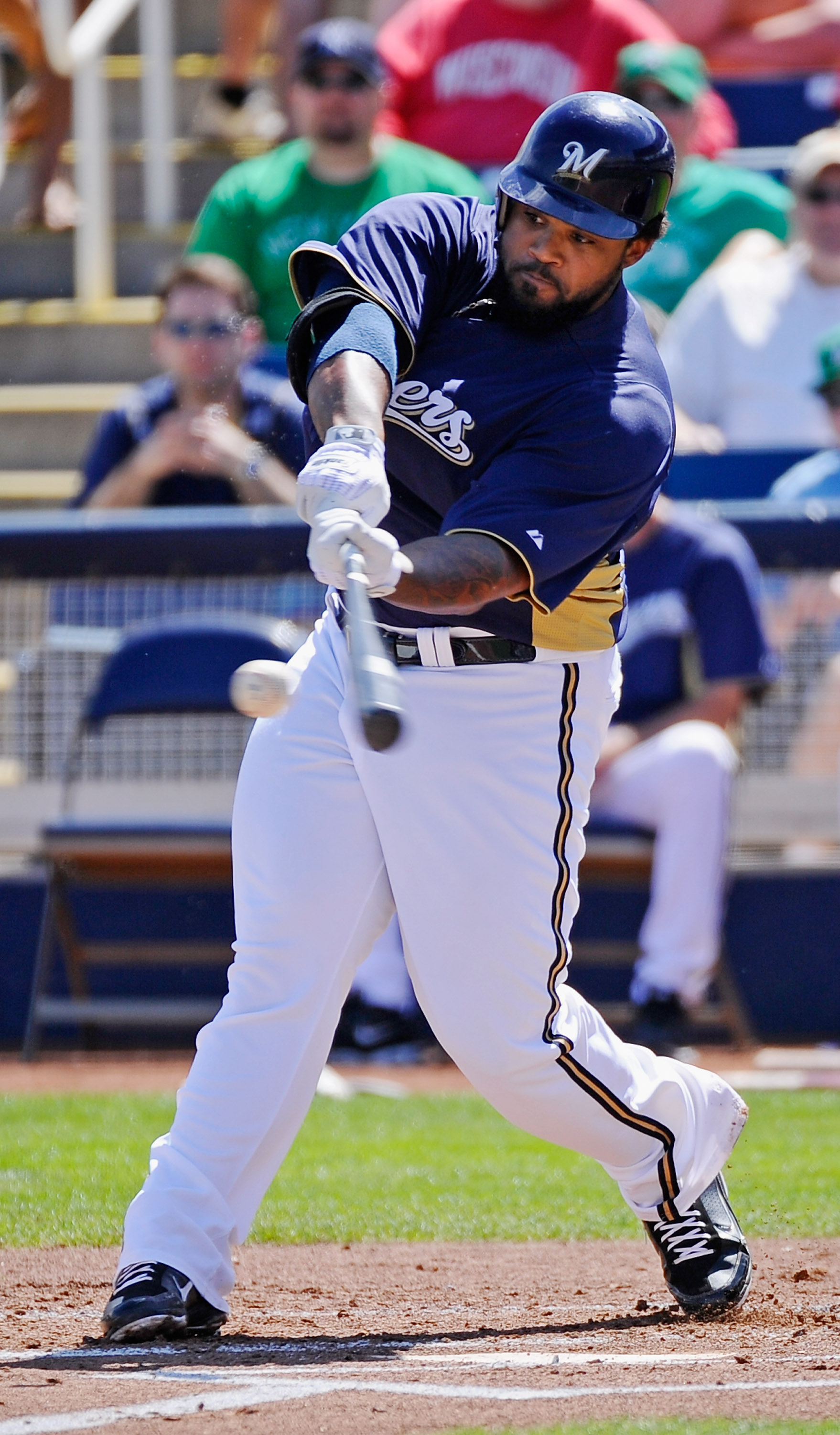 PHOENIX, AZ - MARCH 17: Prince Fielder #28 of the Milwaukee Brewers hits a basehit against pitcher Edwin Jackson #33 of the Chicago White Sox during the first inning of the spring training game at Maryvale Baseball Park on March 17, 2011 in Phoenix, Arizo
