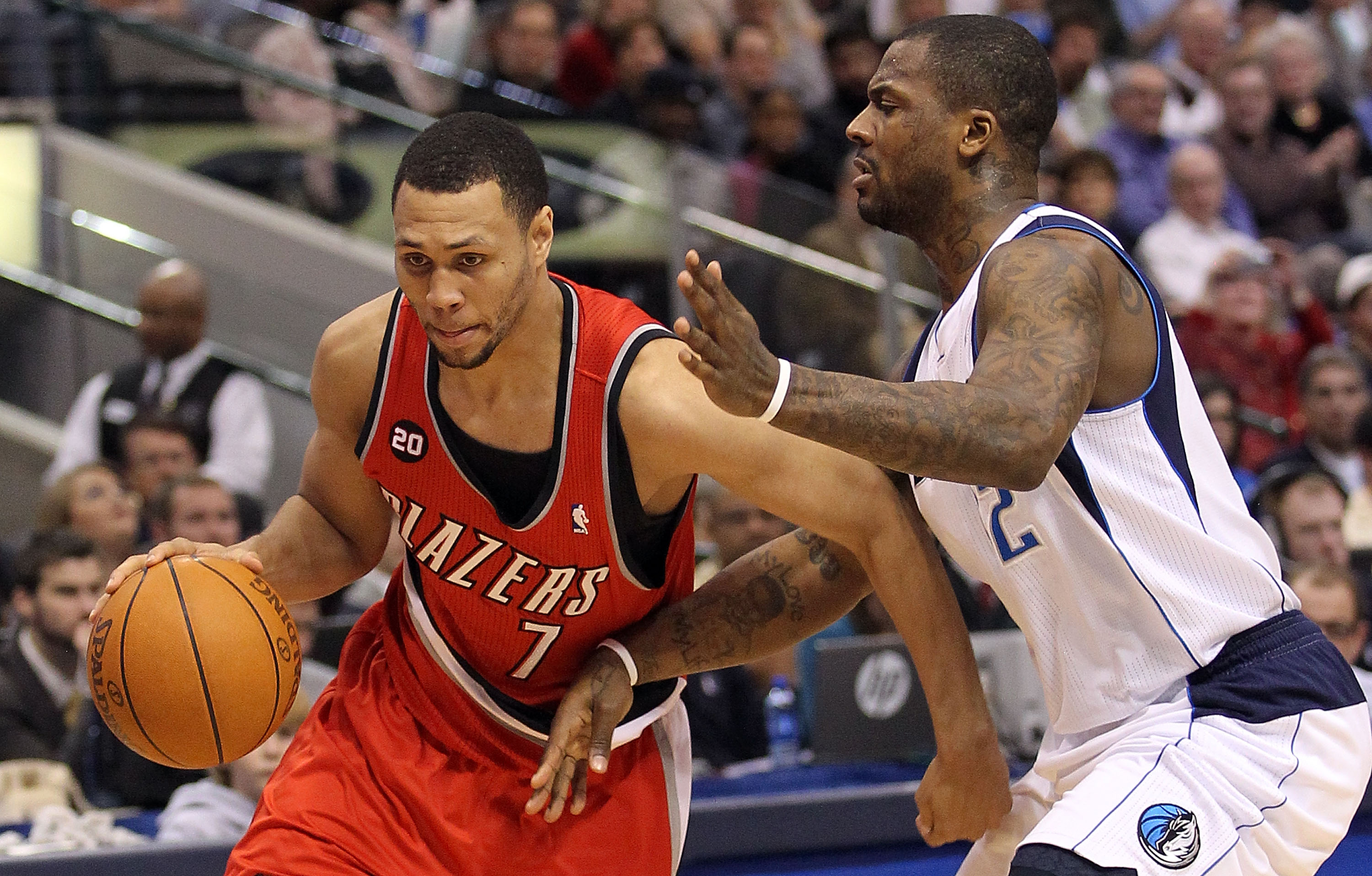 DALLAS, TX - DECEMBER 15:  Guard Brandon Roy #7 of the Portland Trail Blazers dribbles the ball past DeShawn Stevenson #2 of the Dallas Mavericks at American Airlines Center on December 15, 2010 in Dallas, Texas.  NOTE TO USER: User expressly acknowledges