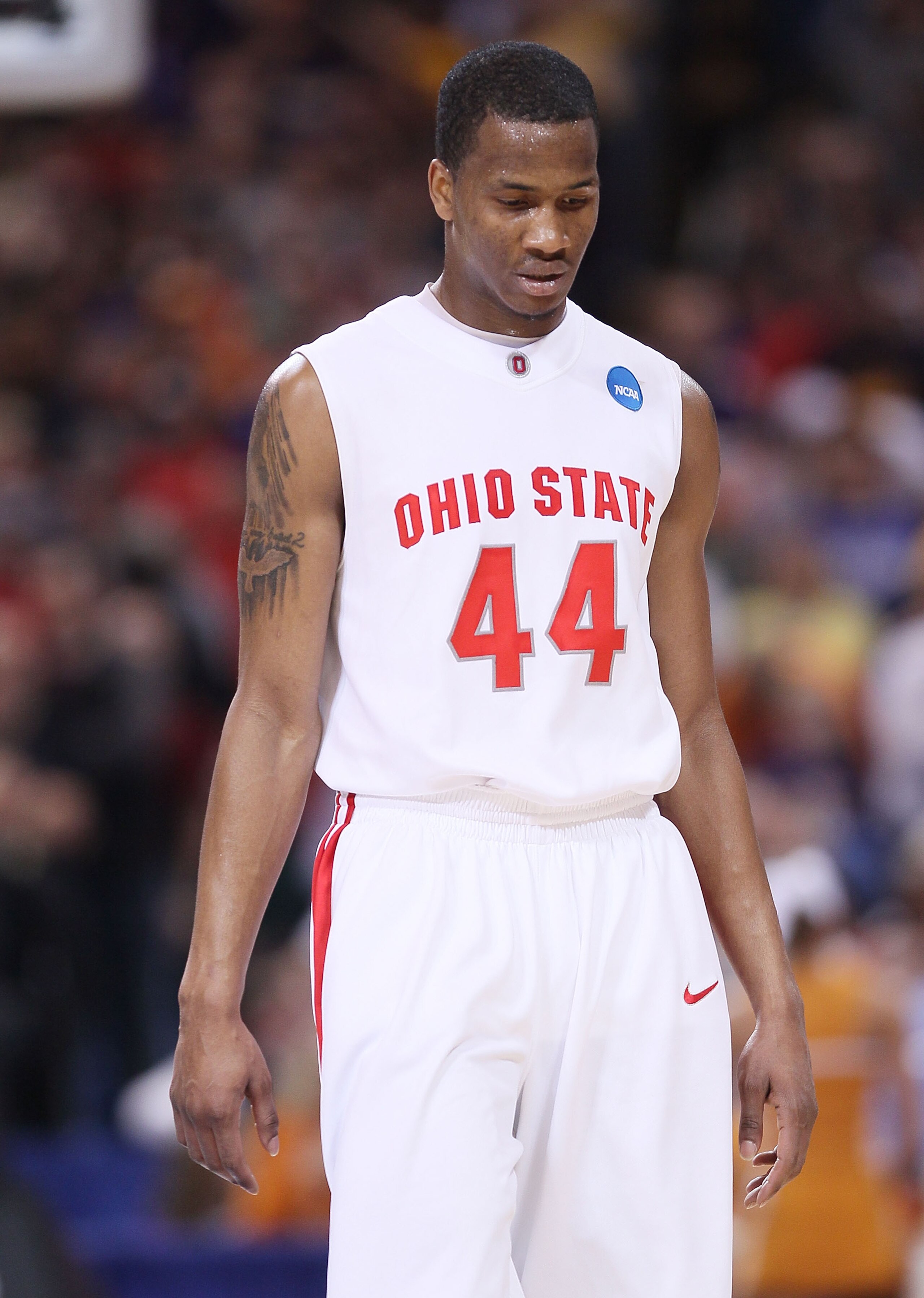 ST. LOUIS - MARCH 26:  William Buford #44 of the Ohio State Buckeyes walks off the court after the loss to the Tennessee Volunteers during the midwest regional semifinal of the 2010 NCAA men's basketball tournament at the Edward Jones Dome on March 26, 20