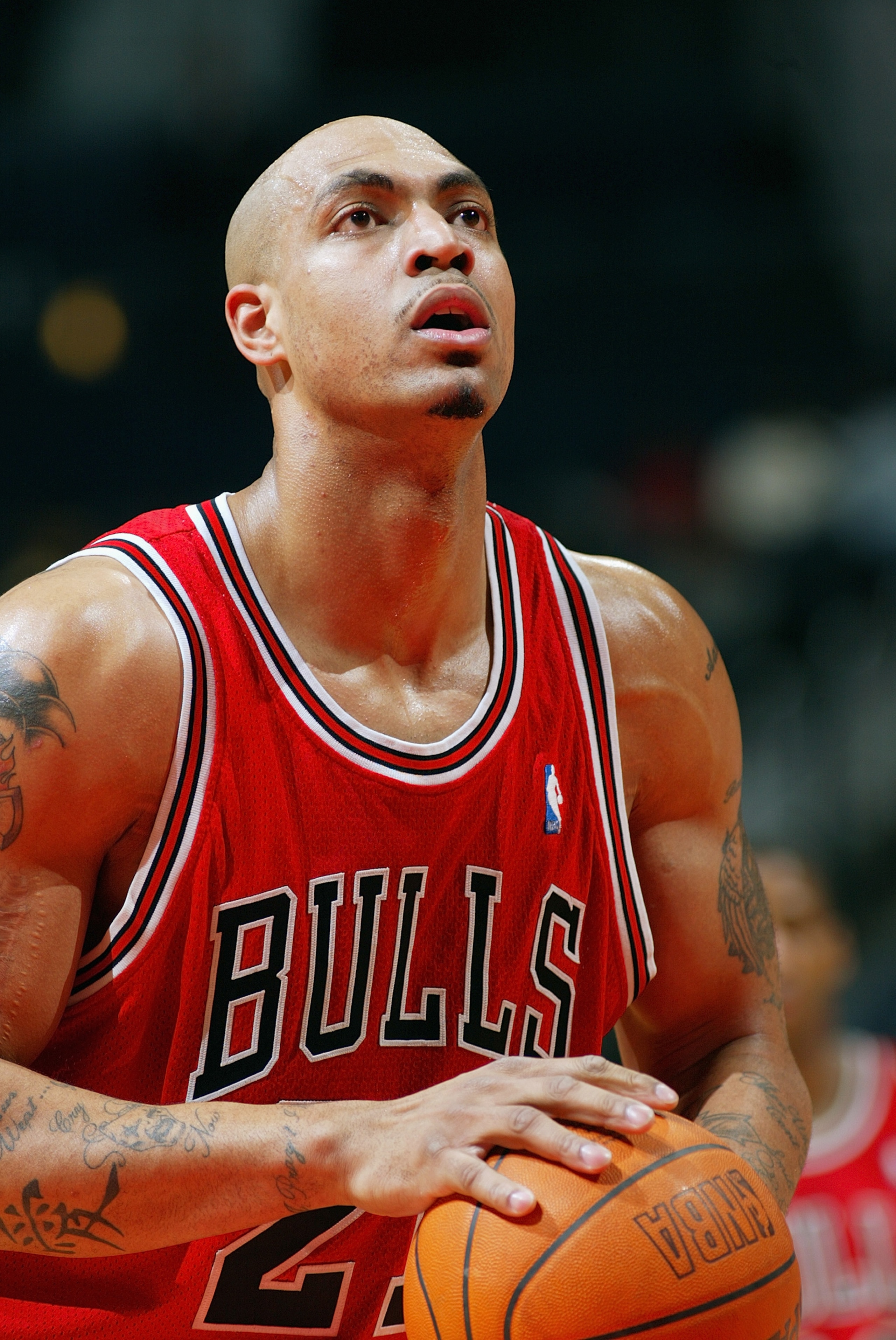 ATLANTA - JANUARY 21: Marcus Fizer #21 of the Chicago Bulls shoots a free throw during the game against the Atlanta Hawks at Philips Arena on January 21, 2004 in Atlanta, Georgia. The Hawks won 97-87. NOTE TO USER: User expressly acknowledges and agre ATLANTA - JANUARY 21: Marcus Fizer #21 of the Chicago Bulls shoots a free throw during the game against the Atlanta Hawks at Philips Arena on January 21, 2004 in Atlanta, Georgia. The Hawks won 97-87. NOTE TO USER: User expressly acknowledges and agre