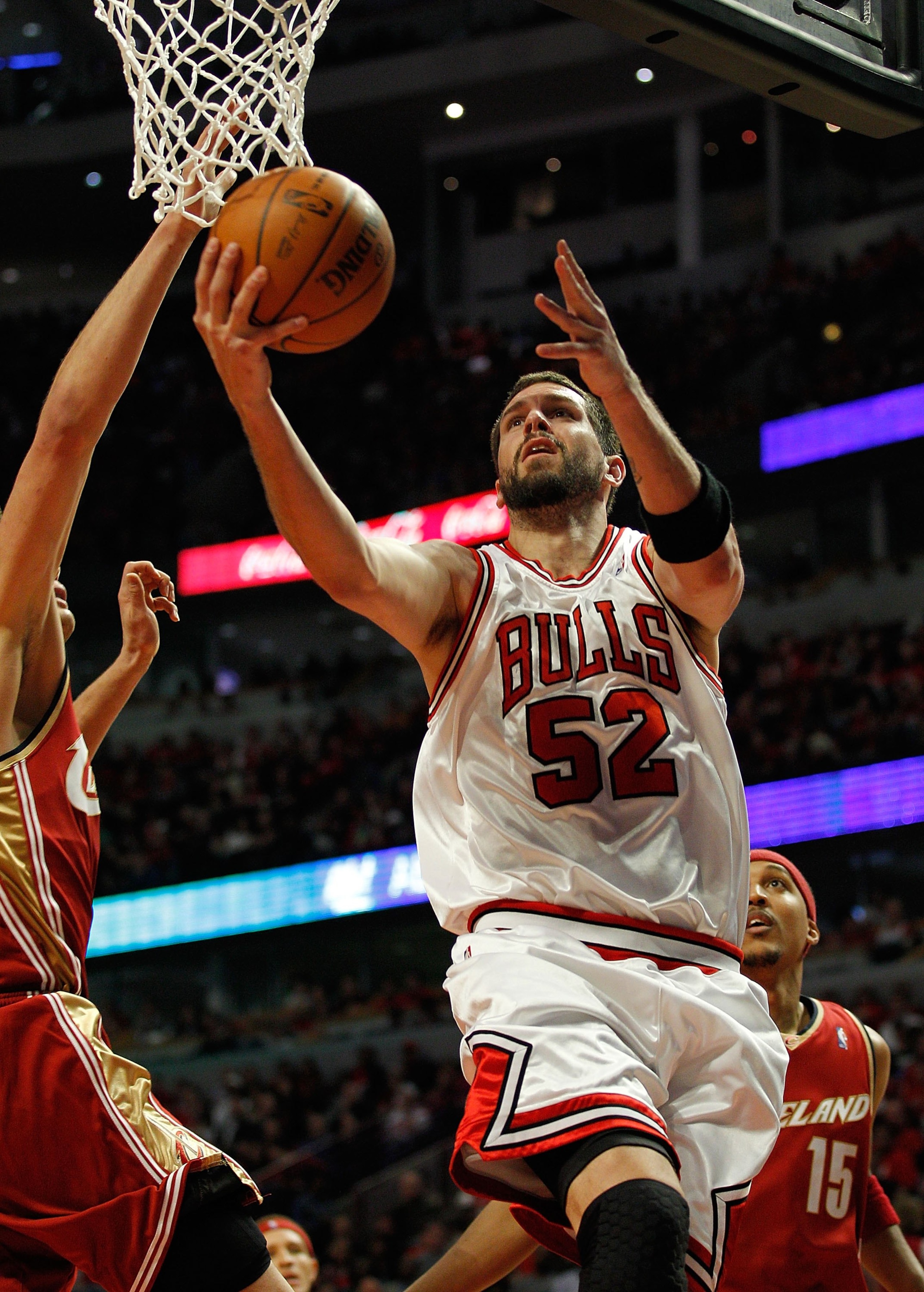 CHICAGO - APRIL 25: Brad Miller #52 of the Chicago Bulls puts up a shot against the Cleveland Cavaliers in Game Four of the Eastern Conference Quarterfinals during the 2010 NBA Playoffs at the United Center on April 25, 2010 in Chicago, Illinois. The Cava CHICAGO - APRIL 25: Brad Miller #52 of the Chicago Bulls puts up a shot against the Cleveland Cavaliers in Game Four of the Eastern Conference Quarterfinals during the 2010 NBA Playoffs at the United Center on April 25, 2010 in Chicago, Illinois. The Cava