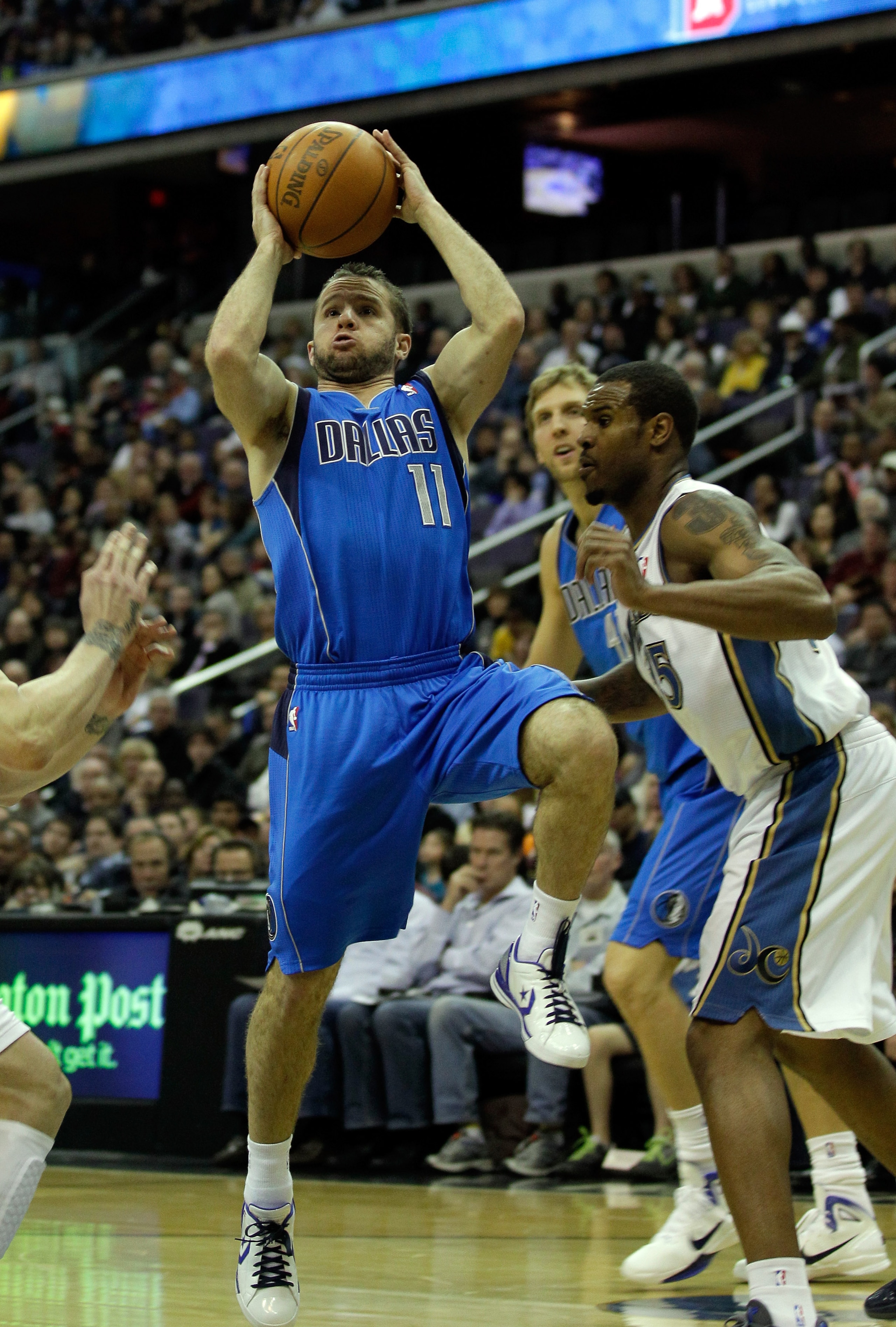 WASHINGTON, DC - FEBRUARY 26: Jose Juan Barea #11 of the Dallas Mavericks puts up a shot against the Washington Wizards at the Verizon Center on February 26, 2011 in Washington, DC. NOTE TO USER: User expressly acknowledges and agrees that, by downloading