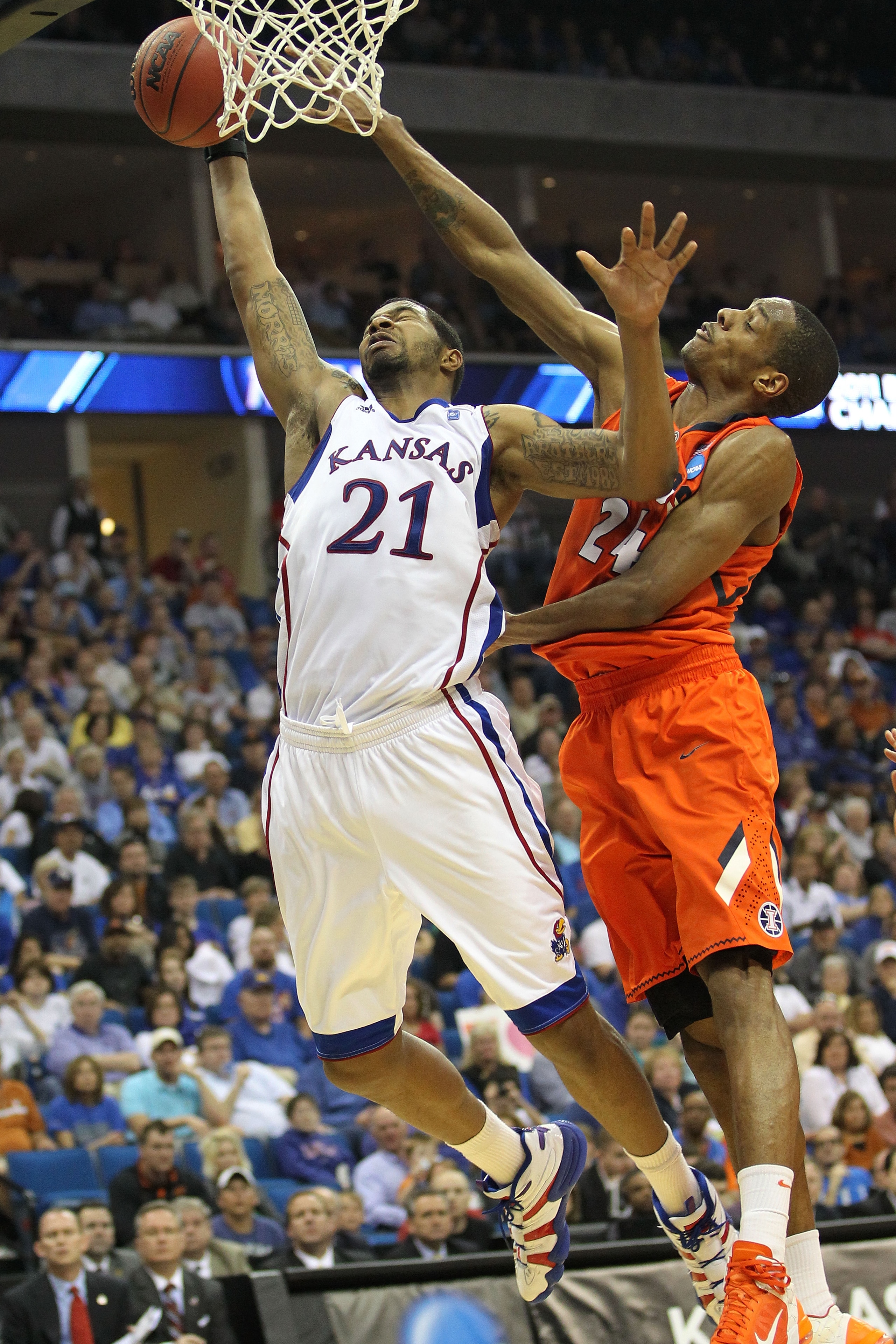 TULSA, OK - MARCH 20:  Markieff Morris #21 of the Kansas Jayhawks goes up for a shot against Mike Davis #24 of the Illinois Fighting Illini during the third round of the 2011 NCAA men's basketball tournament at BOK Center on March 20, 2011 in Tulsa, Oklah