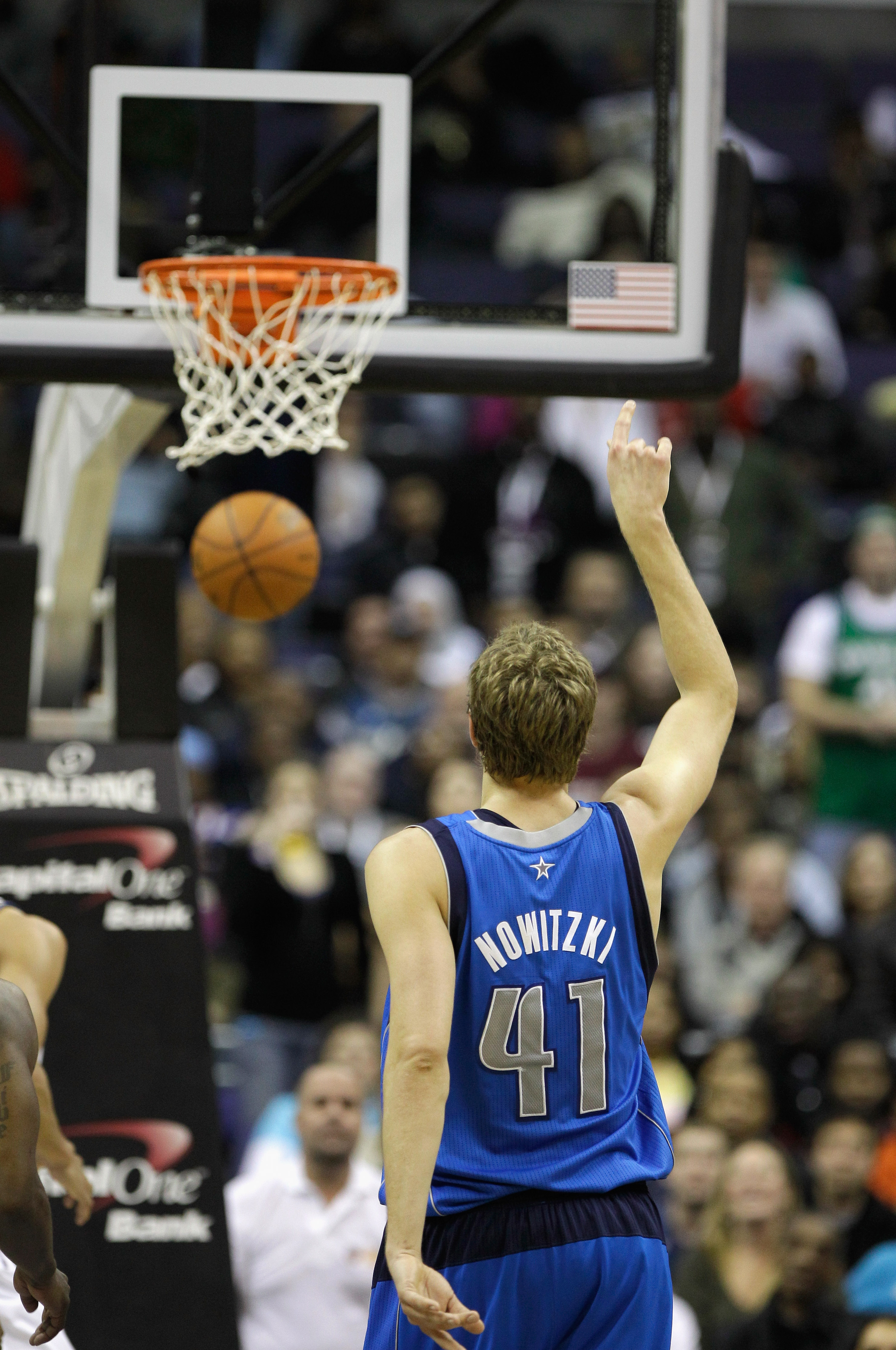 WASHINGTON, DC - FEBRUARY 26: Dirk Nowitzki #41 of the Dallas Mavericks shoots a free throw against the Washington Wizards at the Verizon Center on February 26, 2011 in Washington, DC. NOTE TO USER: User expressly acknowledges and agrees that, by download